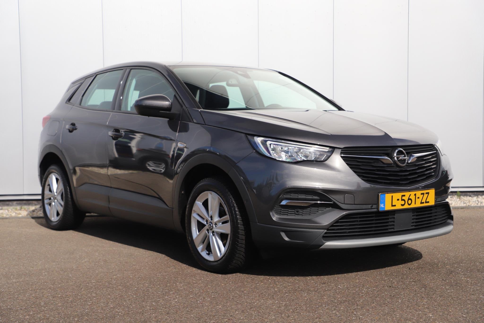 Opel Grandland X 1.2 Turbo Elegance 131PK Automaat LMV Sport, Auto's, Gebruikt, 1199 cc, Met garantie (alle), Leder en Stof