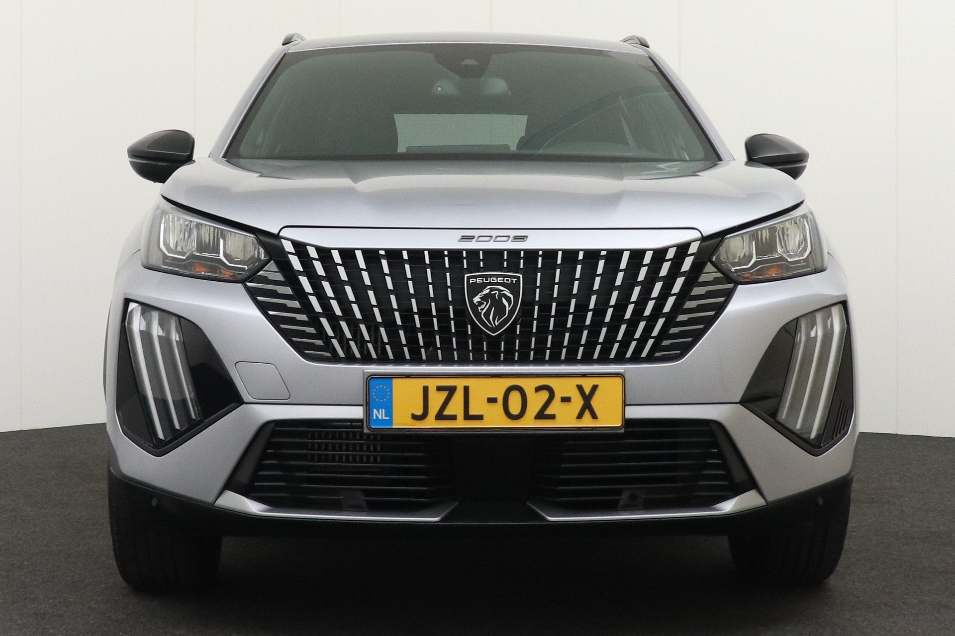 Peugeot 2008 167 PK Aut. Hybrid Allure Half-Leder Climate Ca, Auto's, Gebruikt, 1199 cc, Leder en Stof, Bedrijf
