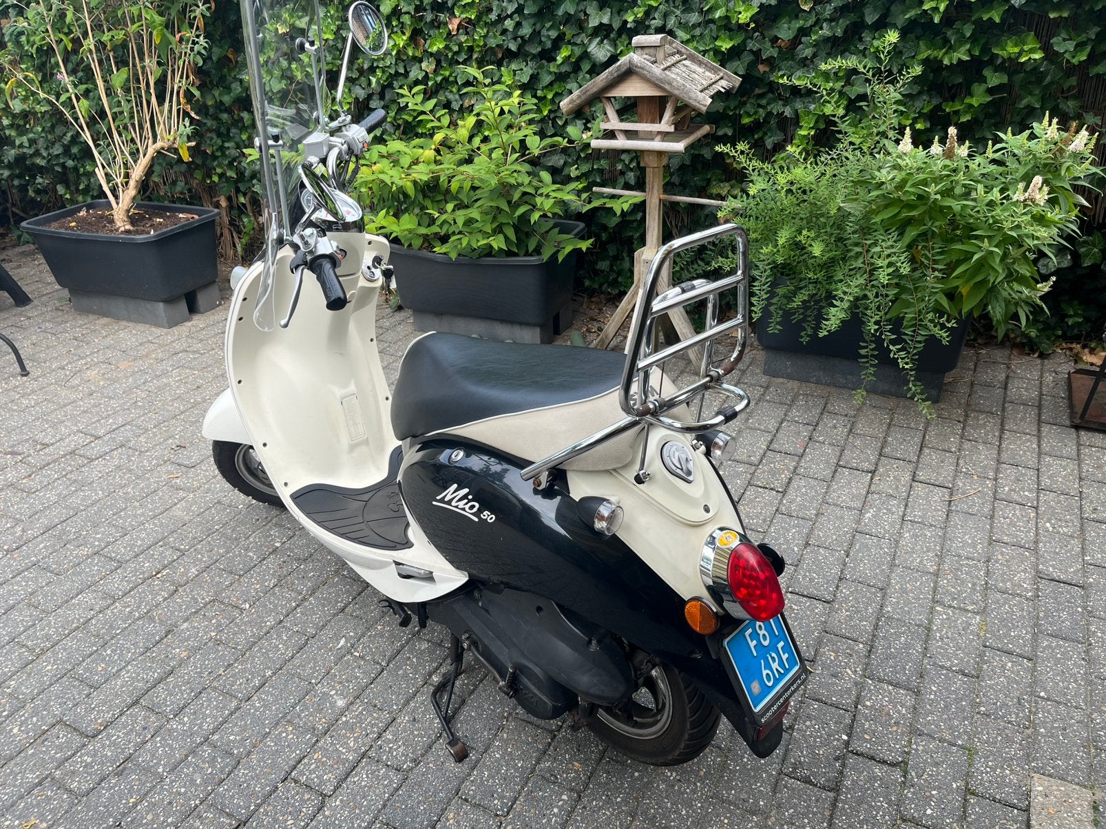 Te koop z.g.o.h sym mio snorscooter, Ophalen, SYM, Zo goed als nieuw, Benzine