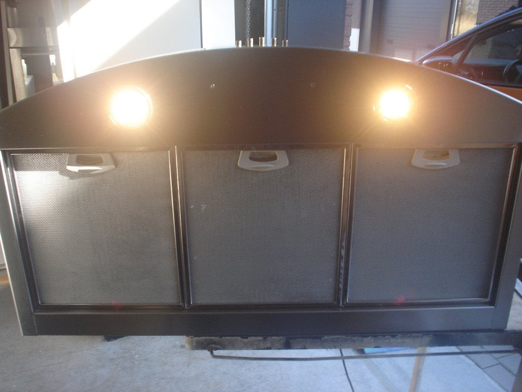 Mooie RVS afzuigkap met ingebouwde verlichting.€60,00, Ophalen, Wandschouwkap, Refurbished, Vrijstaand