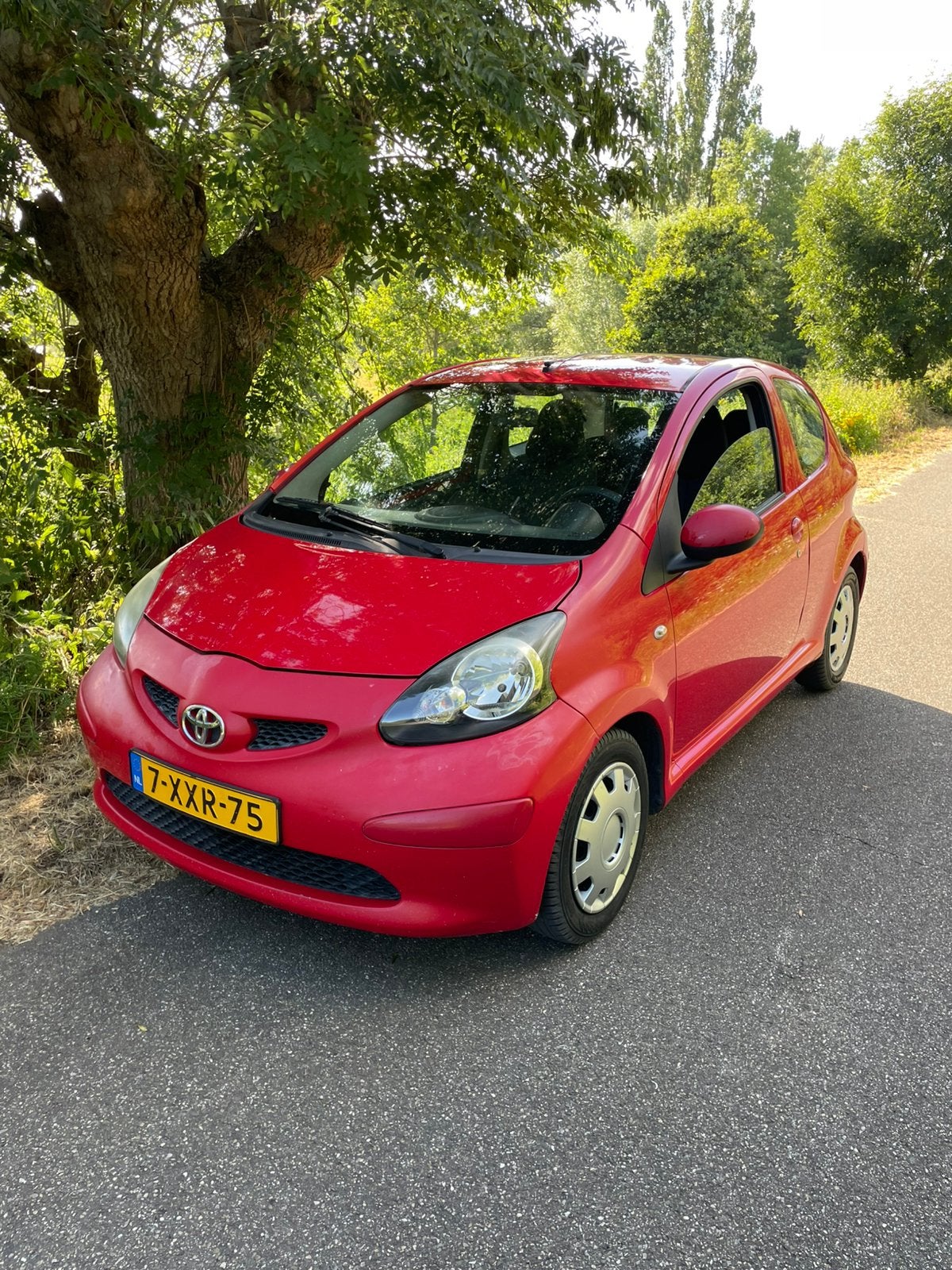 Toyota Aygo 1.0 12V Vvt-i 3DRS MMT 2006 Rood, Voorwielaandrijving, Stof, 4 stoelen, 68 pk