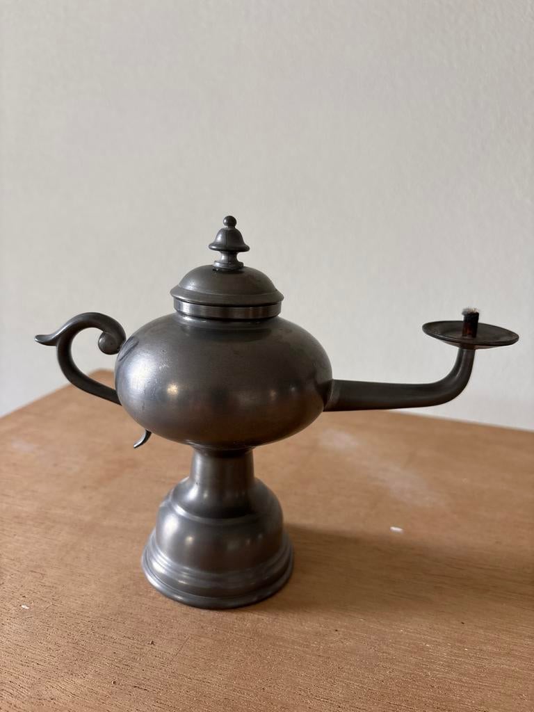 Antieke tinnen olielamp, Ophalen