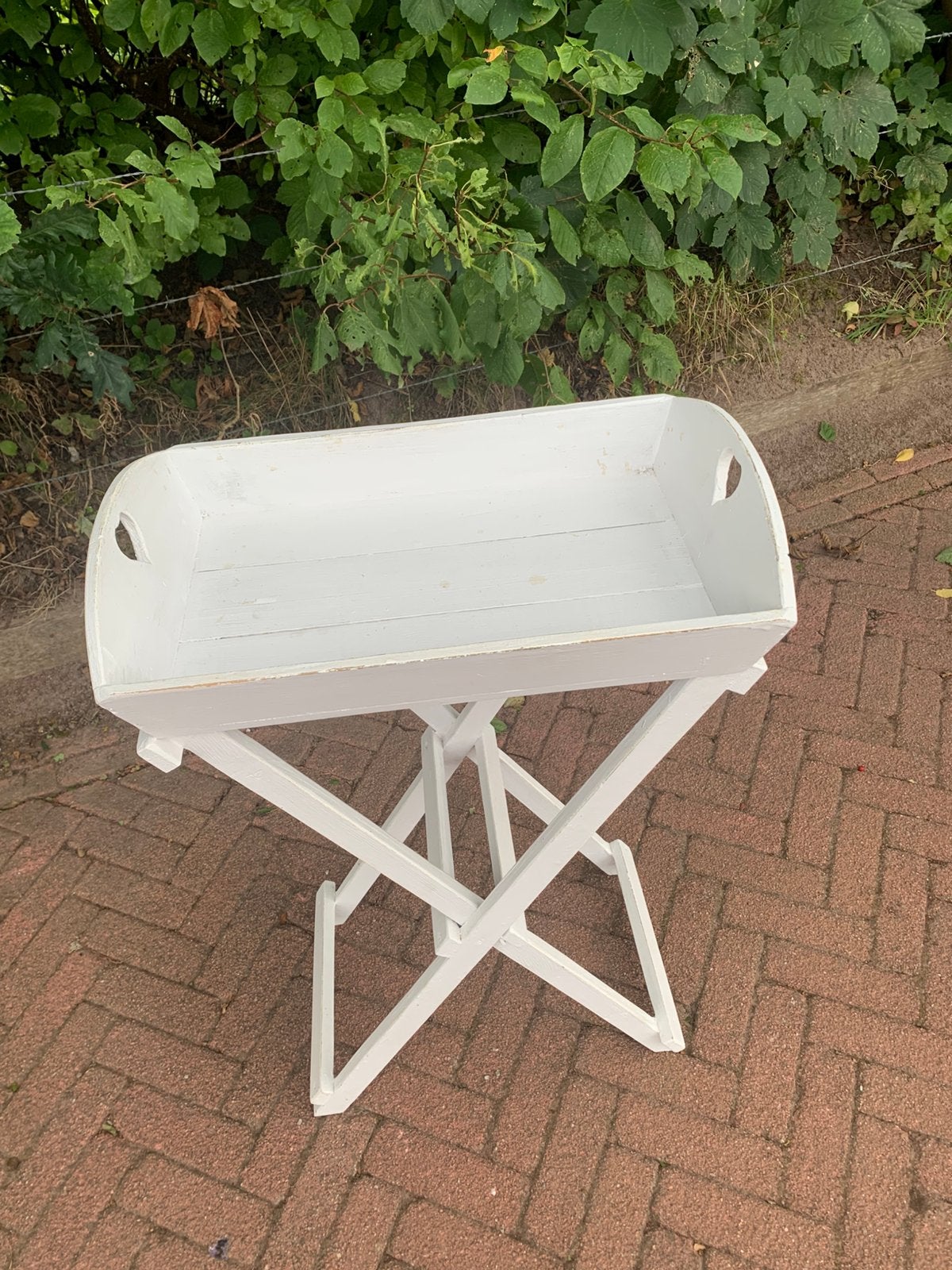 Staand dienblad (butlertray), Ophalen