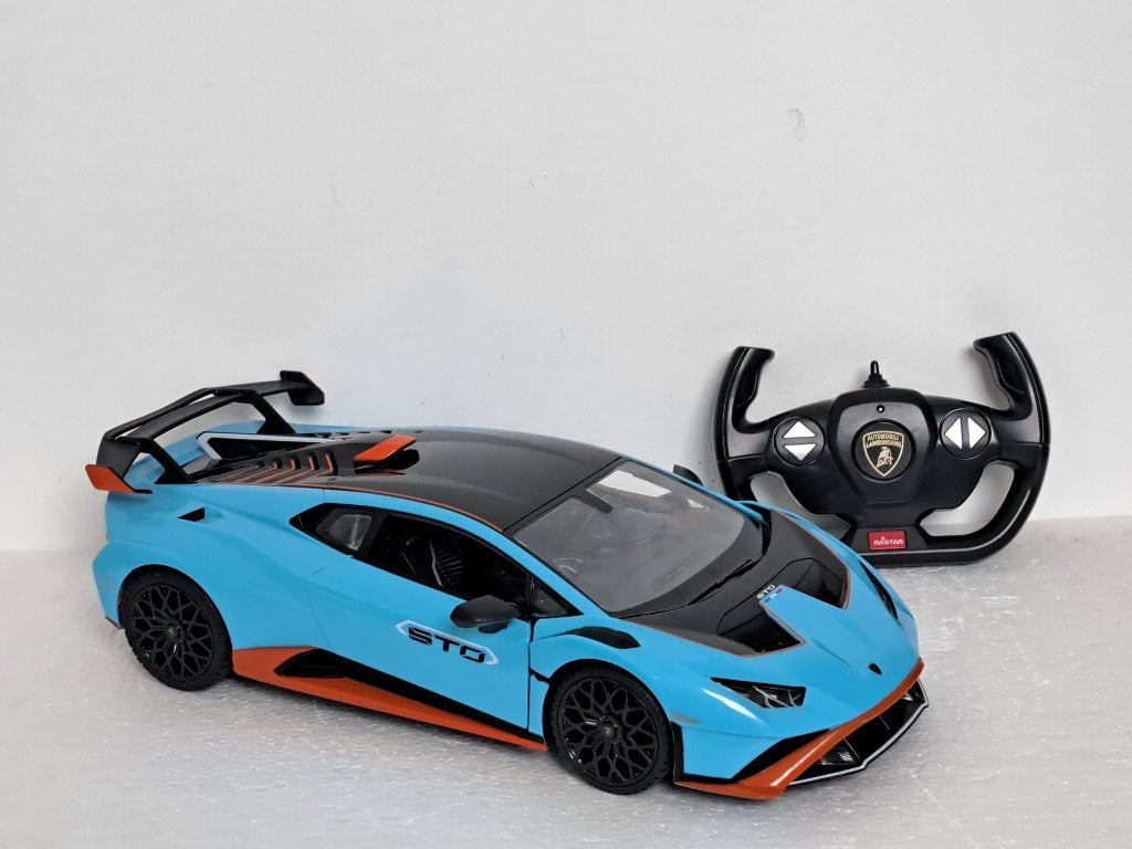 Lamborghini Huracan STO blauw 1/14 Rastar, Ophalen of Verzenden, Gebruikt, Auto, Overige merken