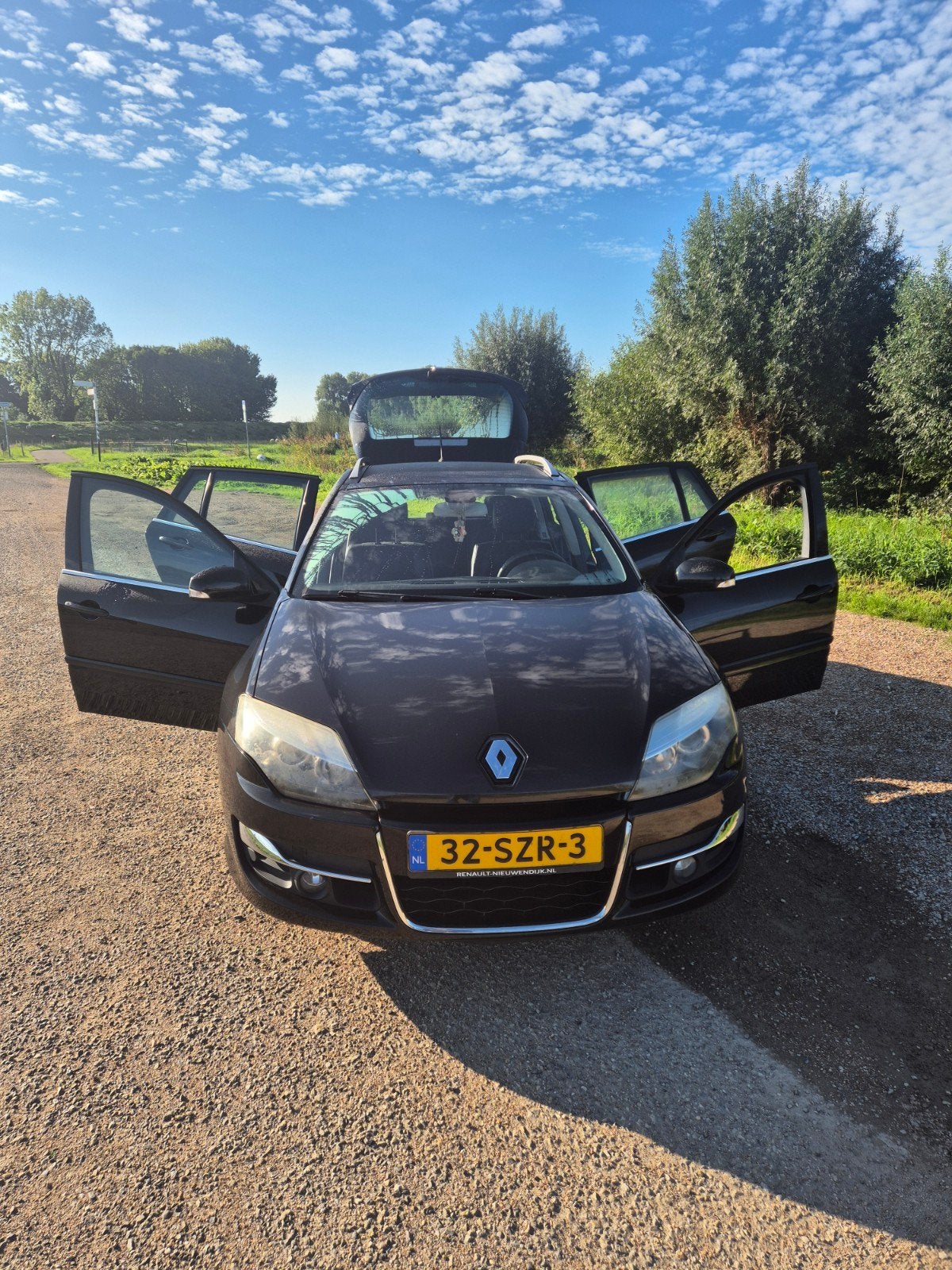Renault Laguna 2.0 16V 140 Estate 2012 Zwart, Auto's, Laguna, 4 cilinders, Zwart, Origineel Nederlands