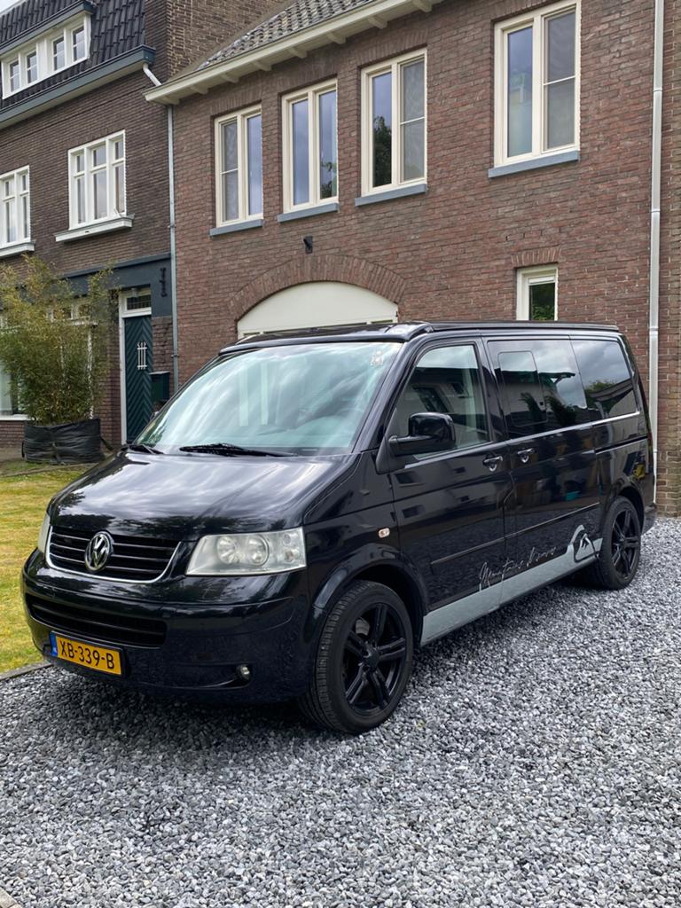 VW T5 luxe 7-zitter en camper met slaaphefdak., Automaat, Buscamper of Camperbus, Volkswagen, Treinzit