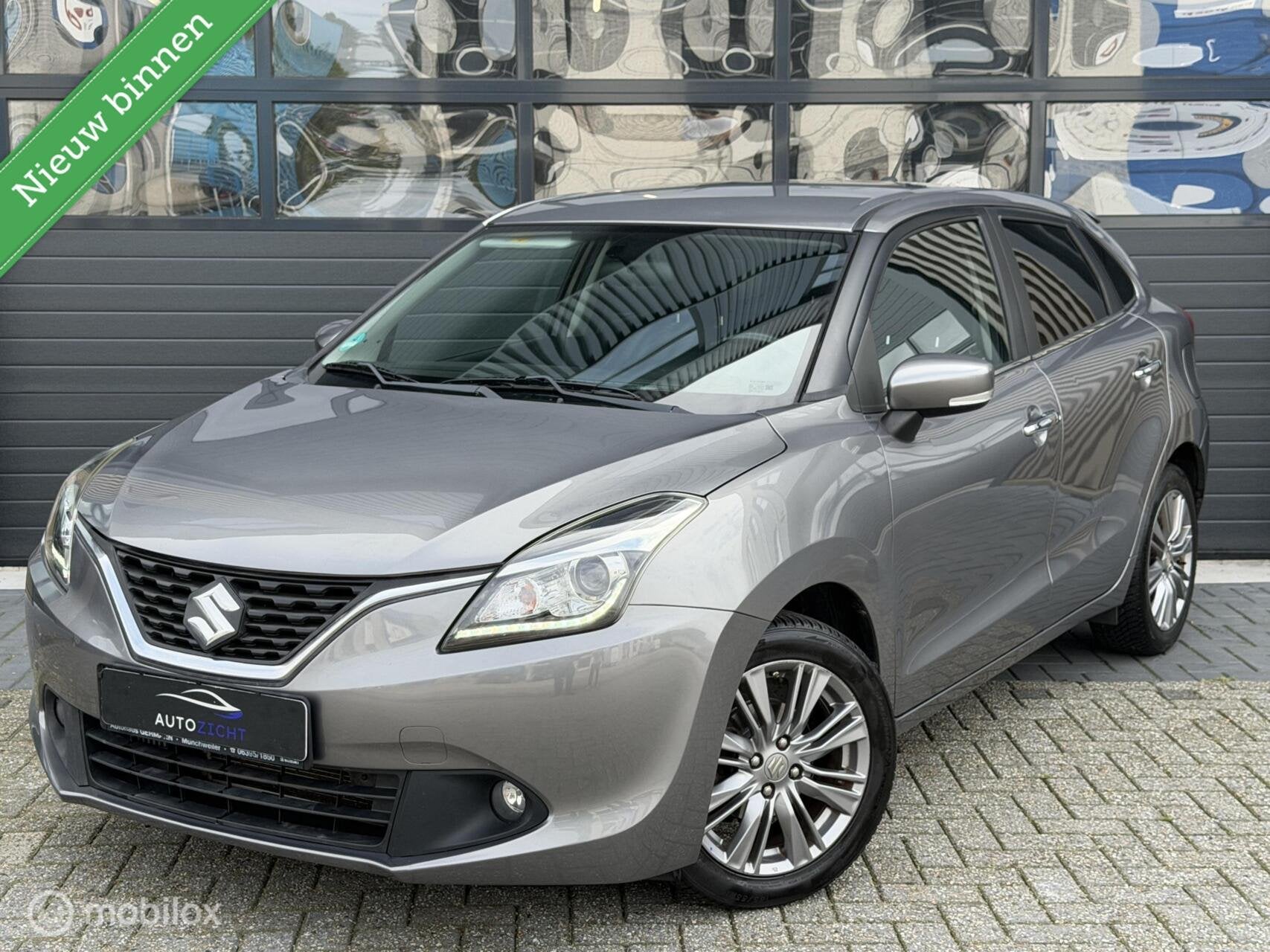 Suzuki Baleno 1.0 Boosterjet High Executive | Camera | ACC, Auto's, Voorwielaandrijving, Gebruikt, 880 kg, Met garantie (alle)