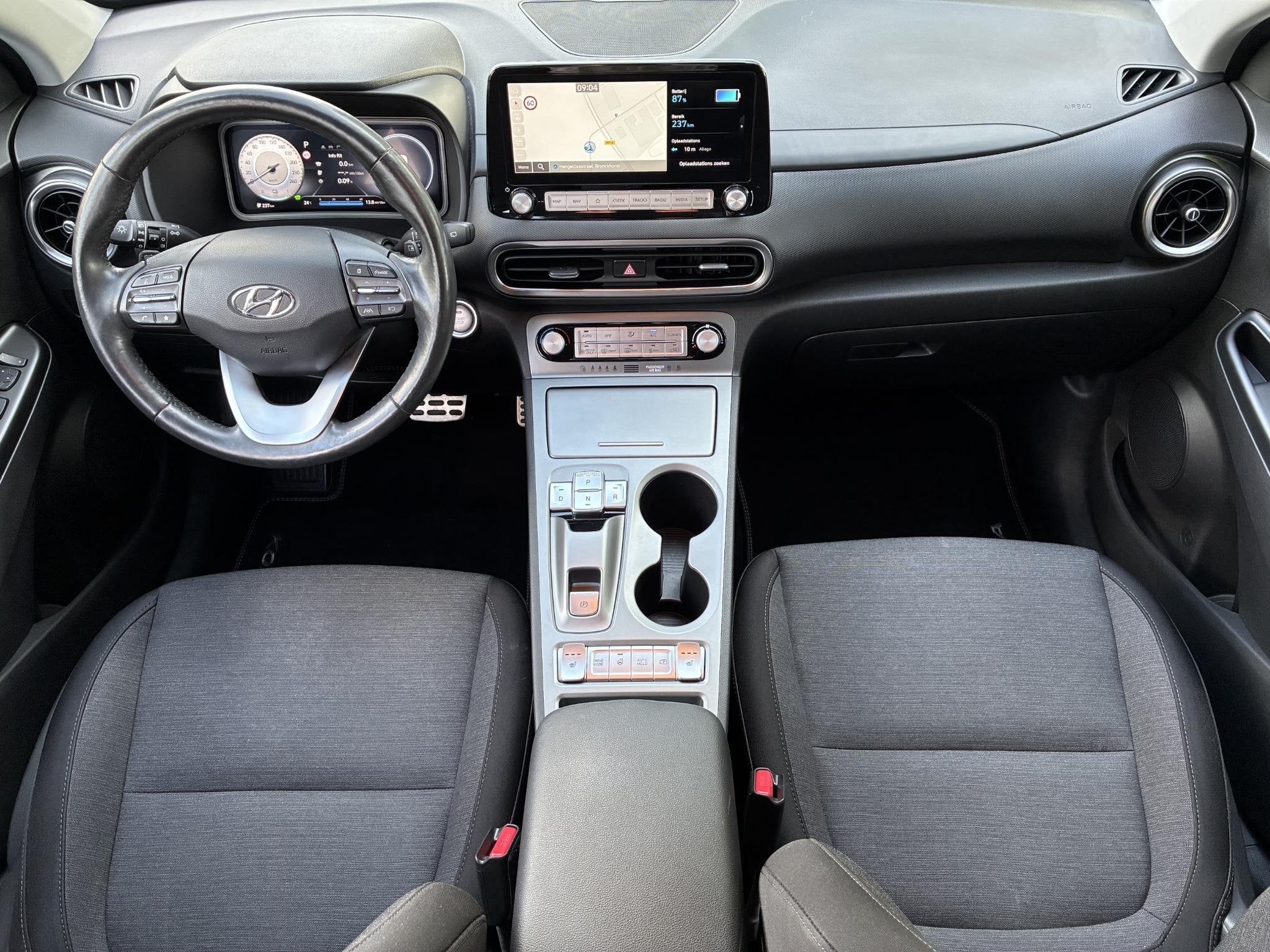Hyundai Kona EV Fashion Design 39 kWh / SOH 97% / Fabrieksga, Auto's, 136 pk, Gebruikt, Blauw, Leder en Stof
