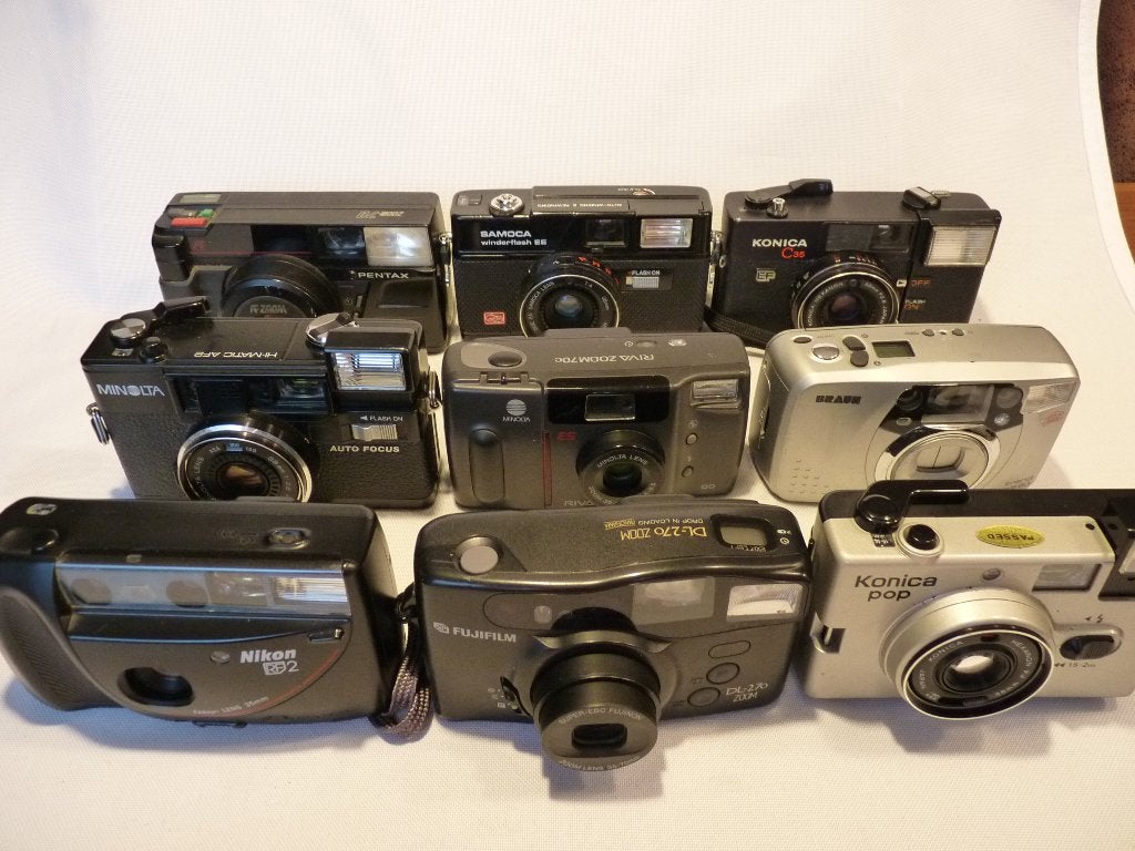 9 analoge camera’s: Nikon, Fuji, Minolta,Pentax,Konica,Braun, Ophalen of Verzenden, Zo goed als nieuw, Compact, Nikon