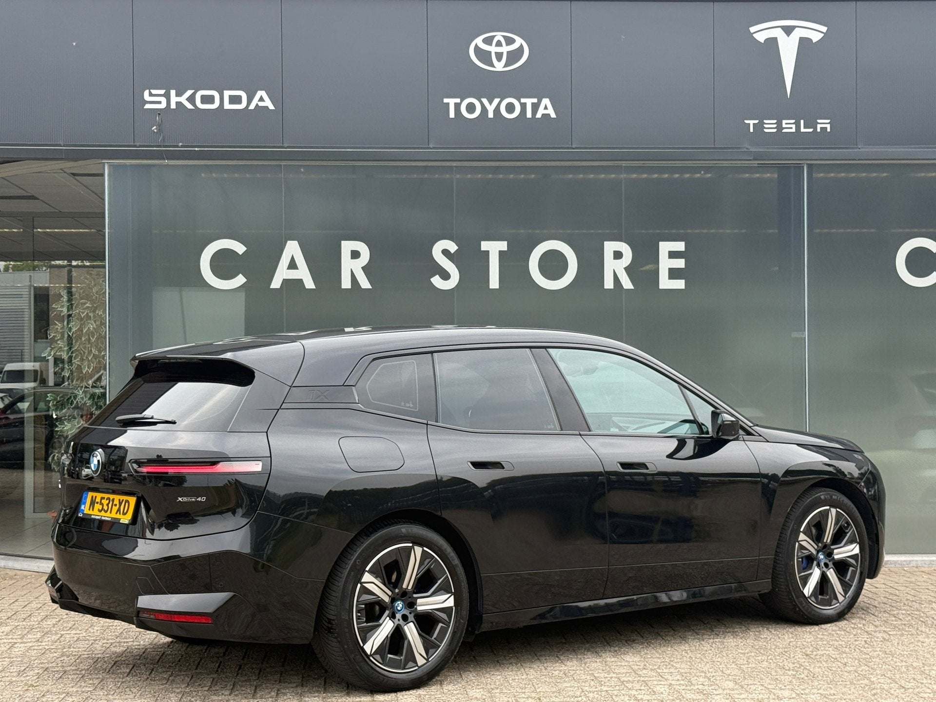 BMW IX XDrive40 High Executive 77 kWh 96% soh PANO|B&W|Trekh, Auto's, BMW, Automaat, Gebruikt, Zwart, Zwart