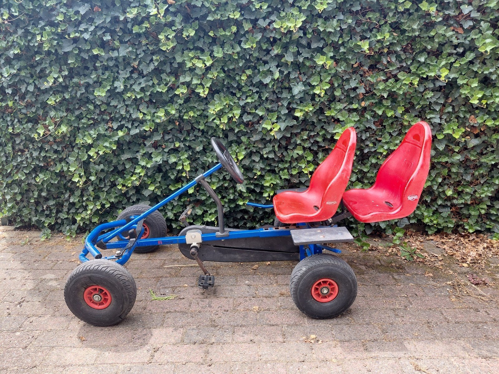 Heutink skelter met twee zitjes - Gebruikte staat, Ophalen, Gebruikt, Trapvoertuig