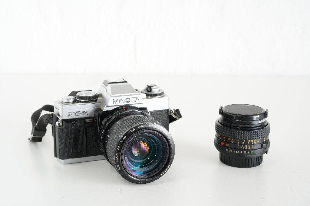 Minolta XG-M 35mm camera 1981 met 2 lenzen, Audio, Tv en Foto, Fotocamera's Analoog, Ophalen of Verzenden, Gebruikt, Spiegelreflex