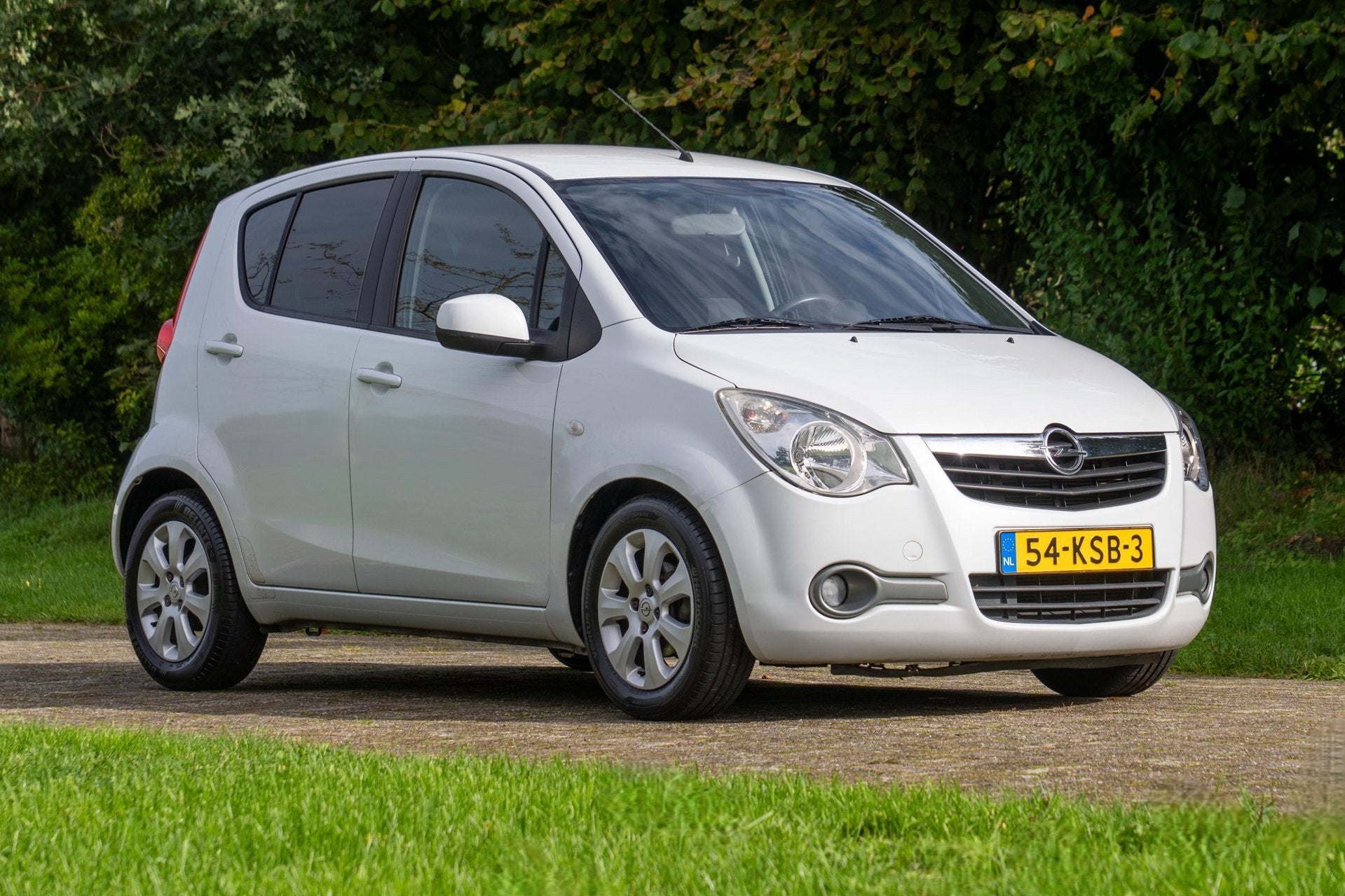 Opel Agila 1.2 Edition Automaat 78.850 km +NAP NL-auto, Auto's, Dealer onderhouden, 4 cilinders, Verwarmde buitenspiegels, Wit