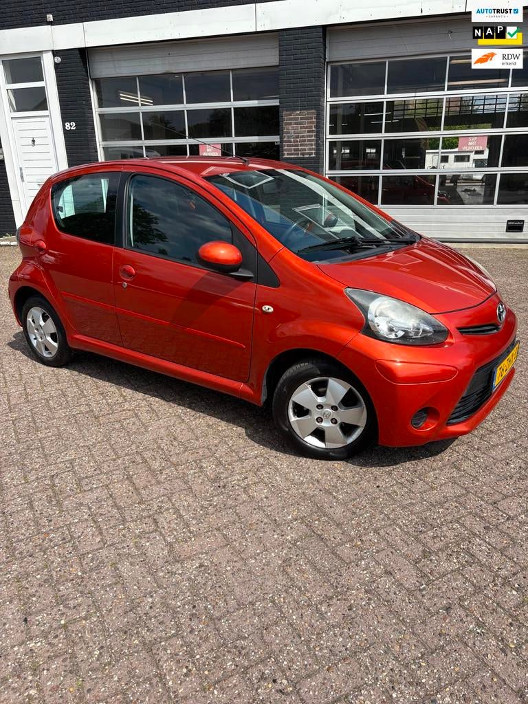 Toyota Aygo 1.0 VVT-i Comfort Orange Centrale Airco, Voorwielaandrijving, Euro 5, Stof, Gebruikt