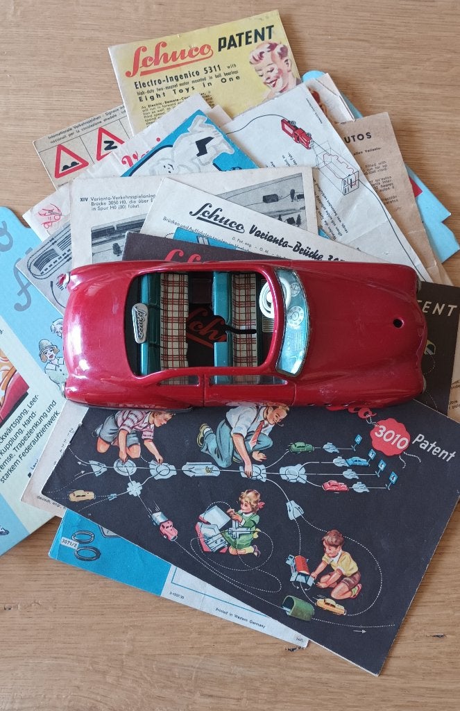 Schuco folders oud en zeer divers plus fraaie body, Antiek en Kunst, Antiek | Speelgoed, Ophalen of Verzenden