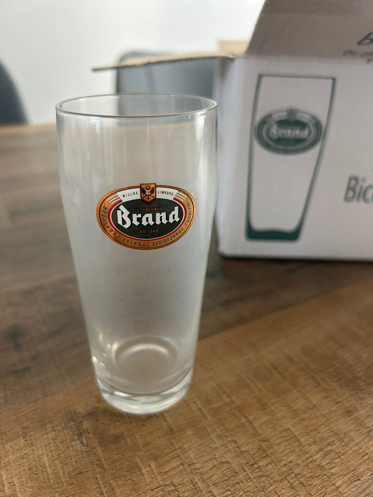 Te koop 12 originele Brand bierglazen, Verzamelen, Ophalen, Nieuw, Bierglas