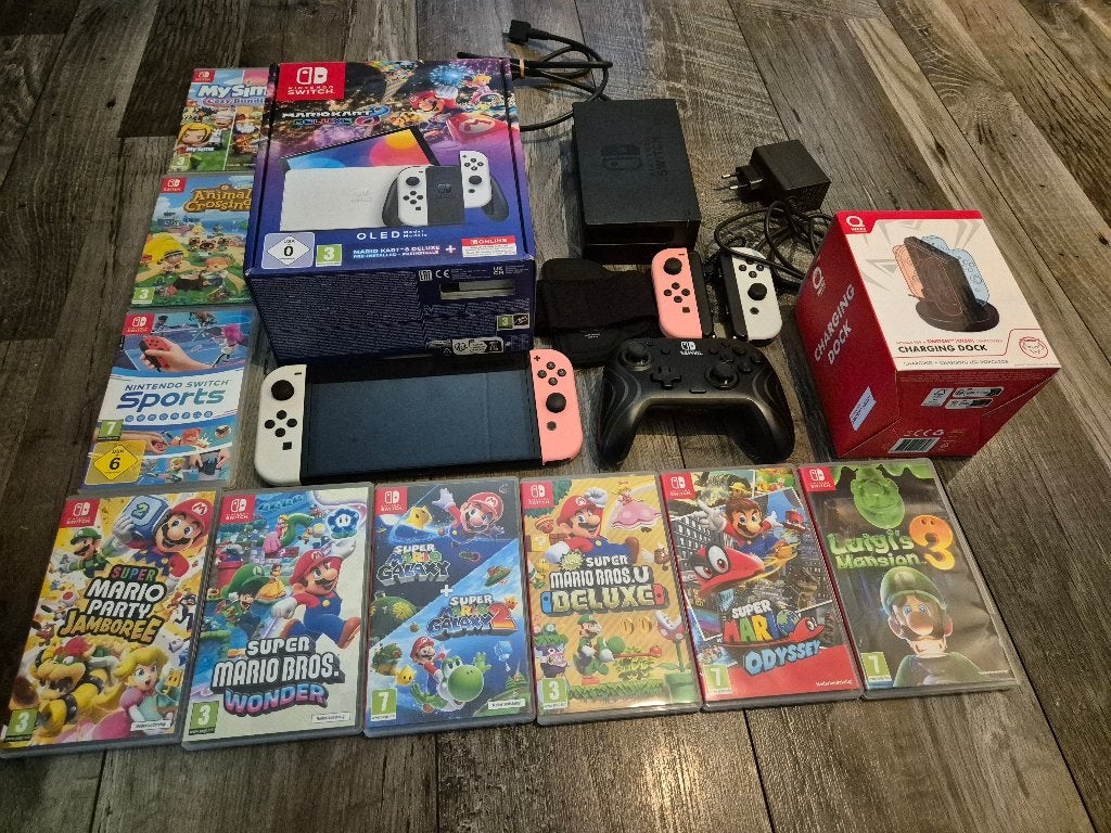 SWITCH OLED + 9 SPELLEN EN ACCESSOIRES!, Met games, Zo goed als nieuw, Met 3 controllers of meer, Switch OLED