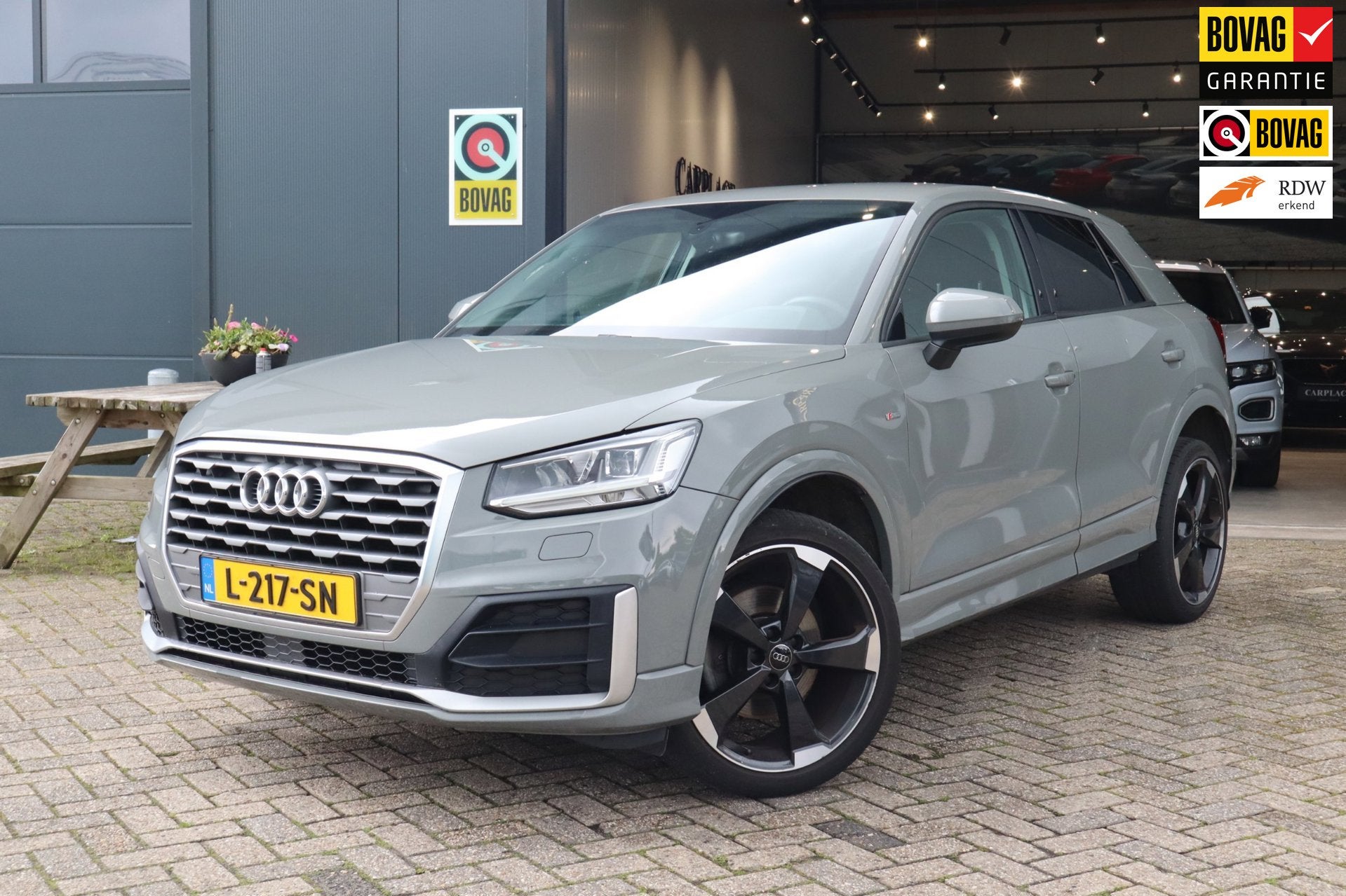 Audi Q2 35 TFSI S Edition-Automaat-Nardo grey, 15 km/l, 4 cilinders, 150 pk, Leder en Stof