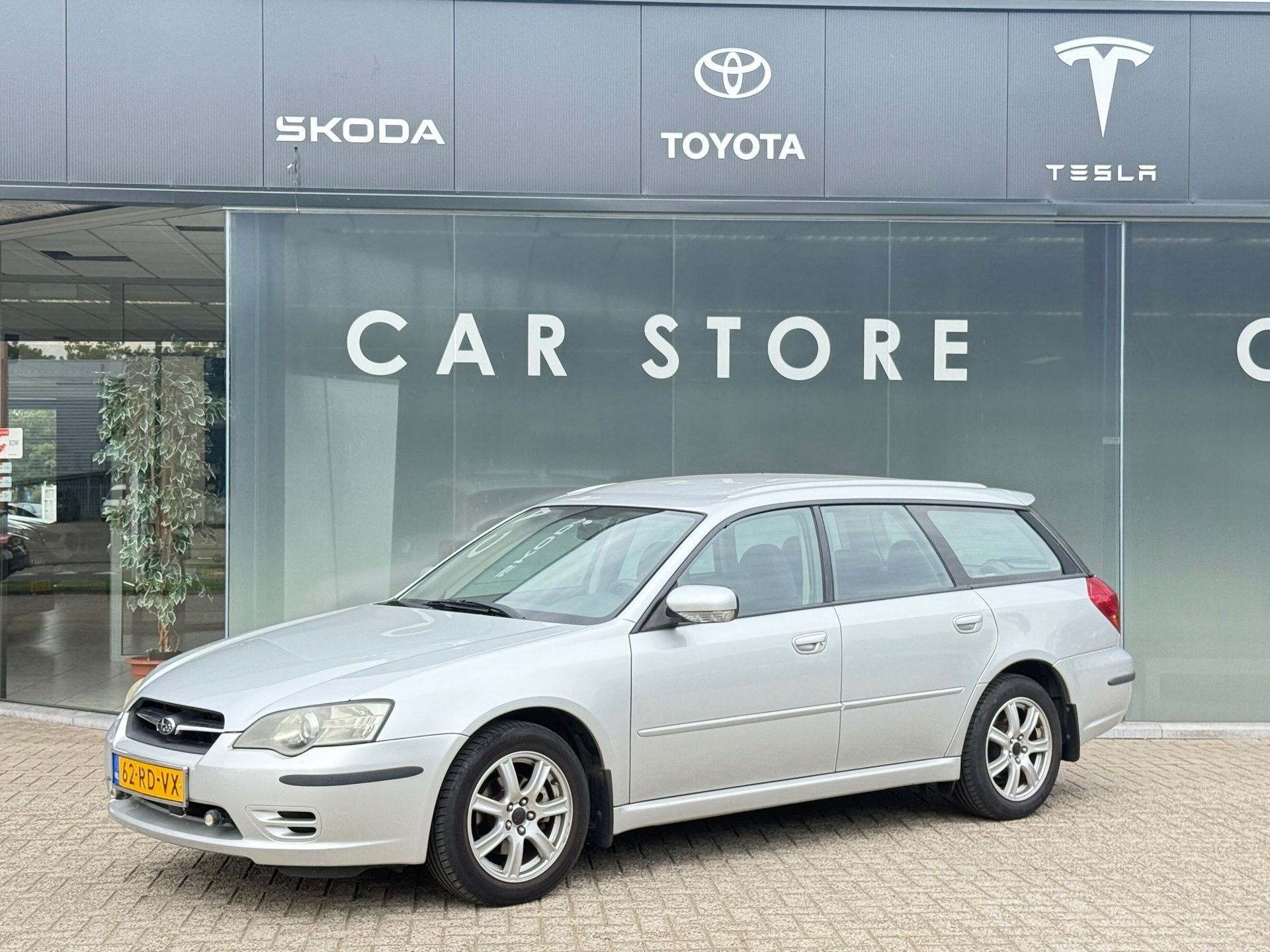 Subaru Legacy Touring Wagon 2.0i Dealer Onderhouden TOP STAA, Auto's, Dealer onderhouden, Gebruikt, Zwart, 4 cilinders