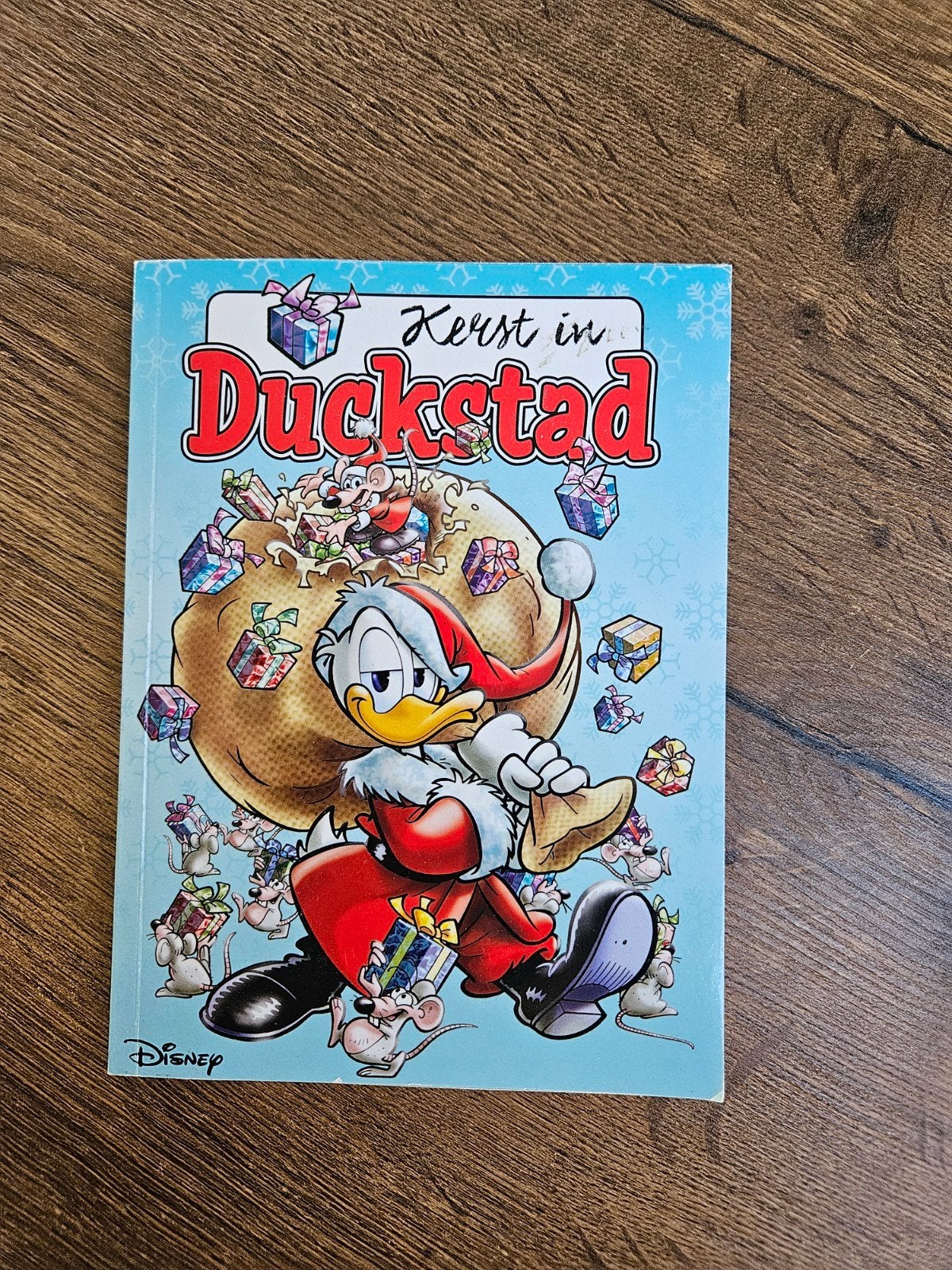 Kerst in Duckstad - Disney stripboek, Eén stripboek, Ophalen of Verzenden, Zo goed als nieuw, Disney