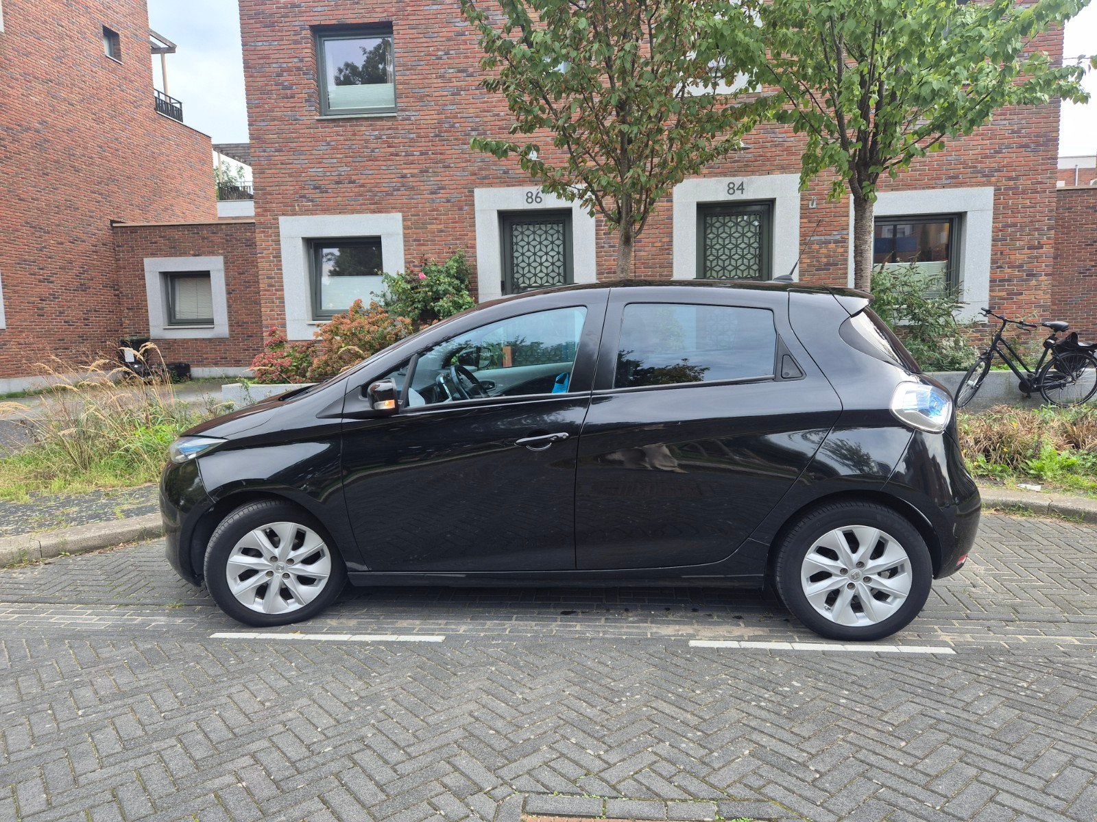 Renault Zoë 2013   77.642 km, Automaat, Stof, Zwart, Elektrisch