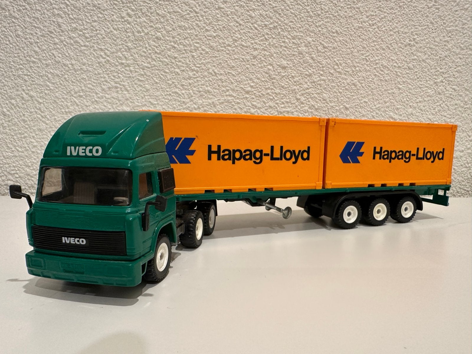 Siku 3424 Iveco Turbo Star Hapag-Lloyd met container, Hobby en Vrije tijd, Ophalen of Verzenden, Gebruikt, Bus of Vrachtwagen