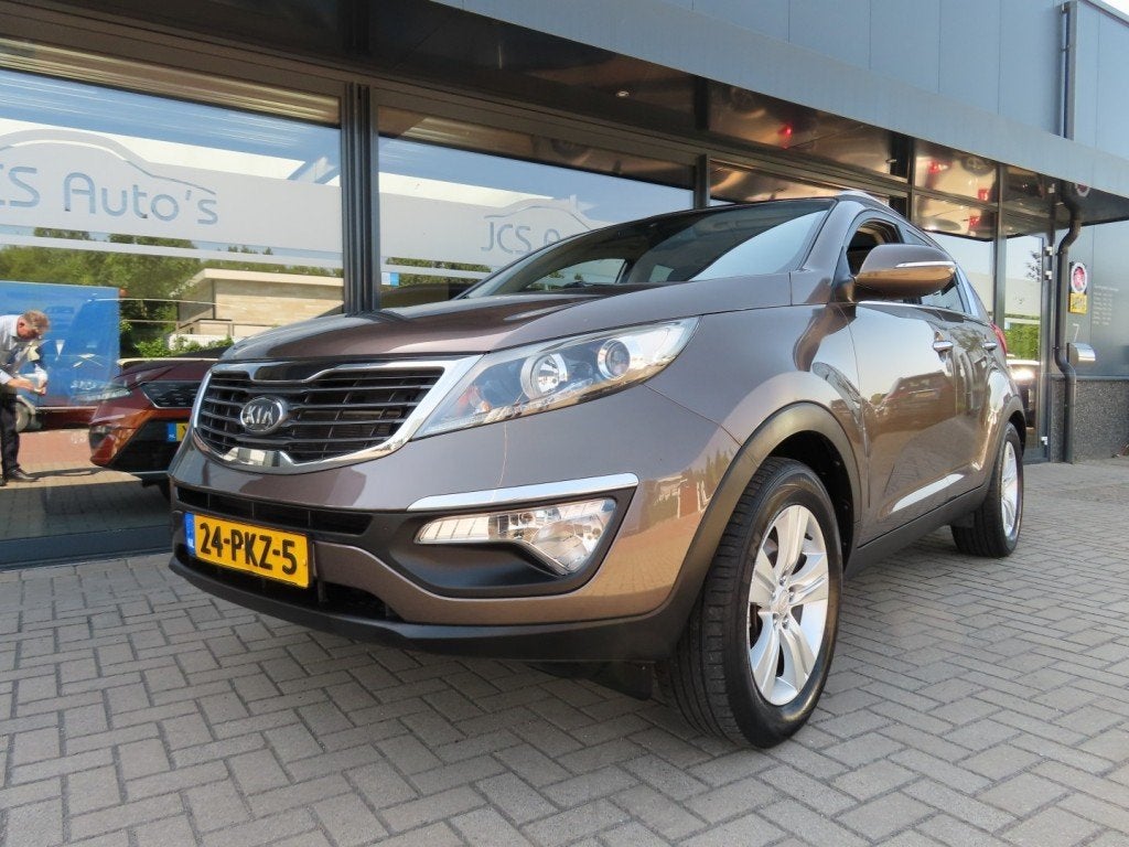 Kia SPORTAGE 2.0 X-ECUTIVE Plus Ecc Cruise Pano Trekhaak 201, Auto's, Gebruikt, 4 cilinders, Bruin, 163 pk