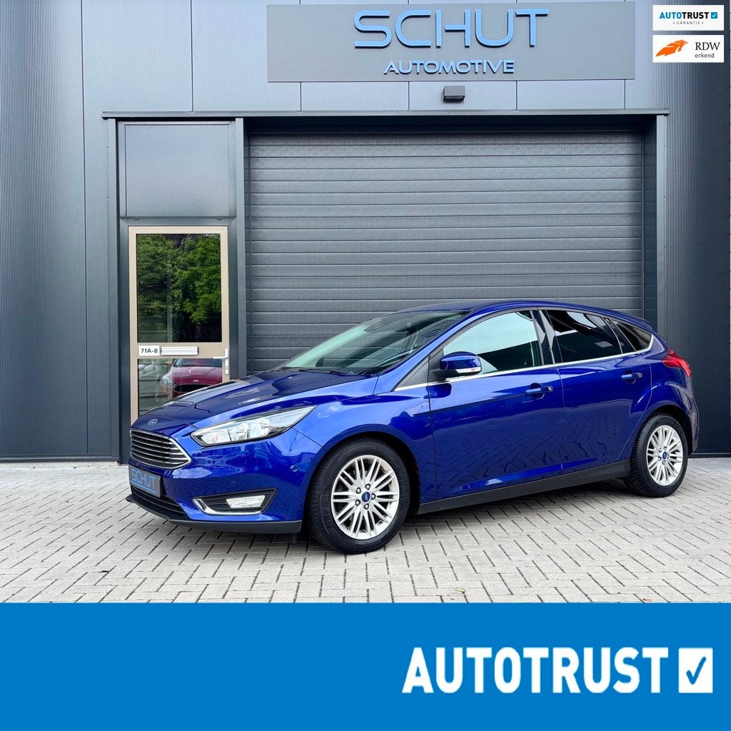 Ford Focus 125pk Titanium CLIMA | CRUISE CONTROL | HALF LEDE, Auto's, Ford, 125 pk, Gebruikt, Zwart, Blauw