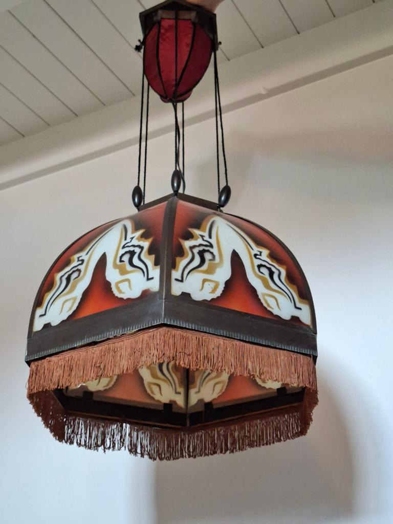 Amsterdamse school lamp, Ophalen