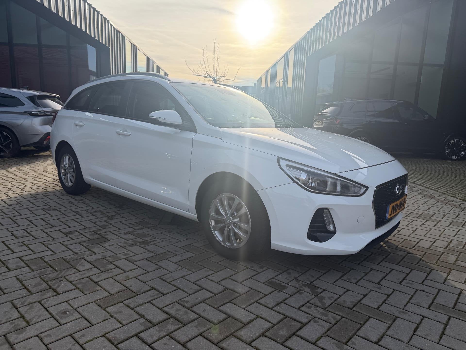 Hyundai I30 Wagon 1.0 T-GDI Comfort Cruise PDC Nwe APK, Auto's, Hyundai, Voorwielaandrijving, Stof, Gebruikt, Wit