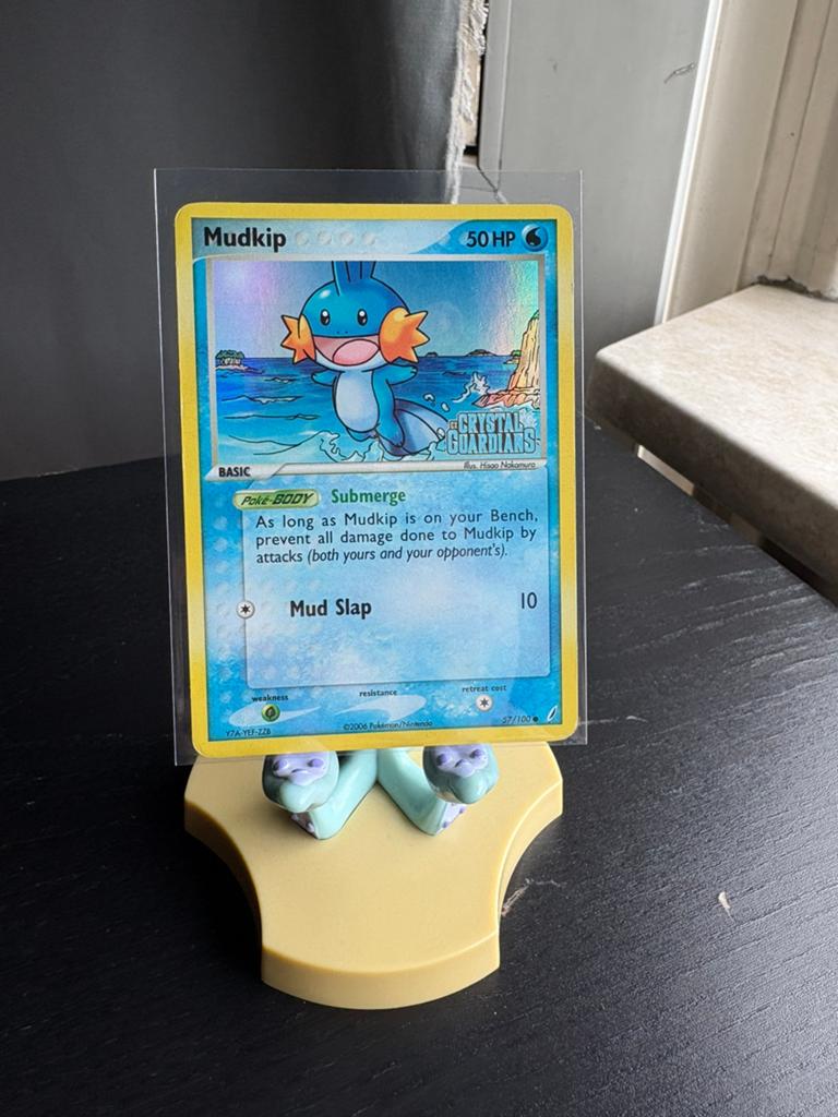 Mudkip 57/100 EX Crystal Guardians Stamped - Played, Hobby en Vrije tijd, Verzamelkaartspellen | Pokémon, Ophalen of Verzenden