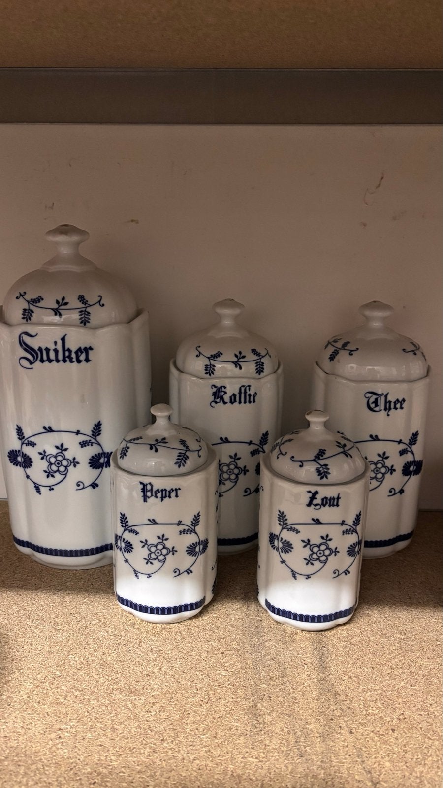Set van voorraadpotten blauw wit, Ophalen
