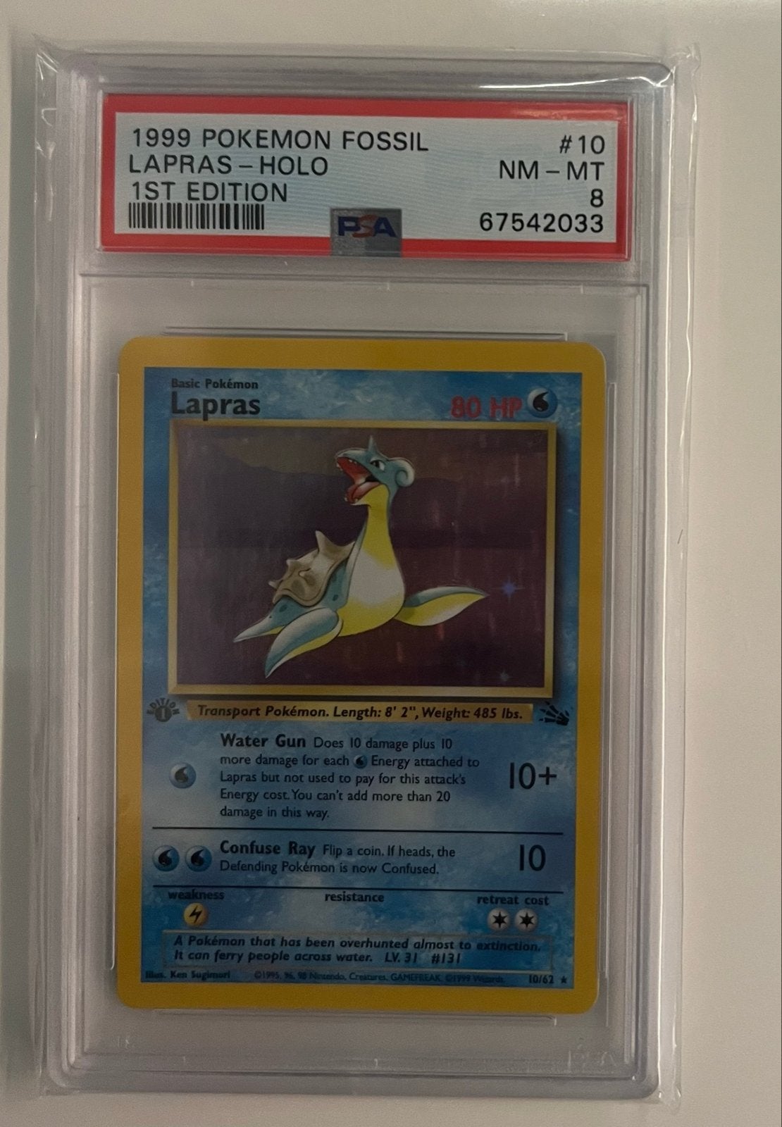 Lapras 10/62 - 1st Edition - Fossil - PSA 7, Ophalen of Verzenden, Zo goed als nieuw, Losse kaart