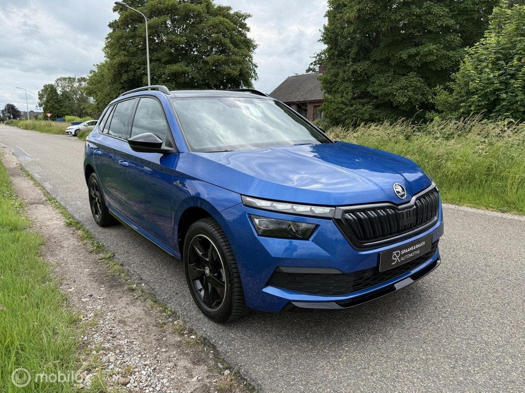 Skoda Kamiq 1.5 TSI ACT Monte Carlo / Pano / CarPlay / Cam, Stof, Zwart, 4 cilinders, 150 pk