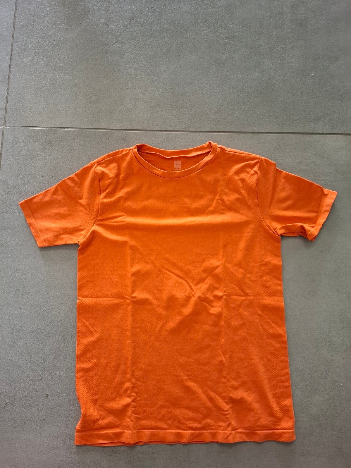 Nieuw donkeroranje shirt maat 146 en 158, Ophalen of Verzenden, Nieuw, Hema, Sport- of Zwemkleding
