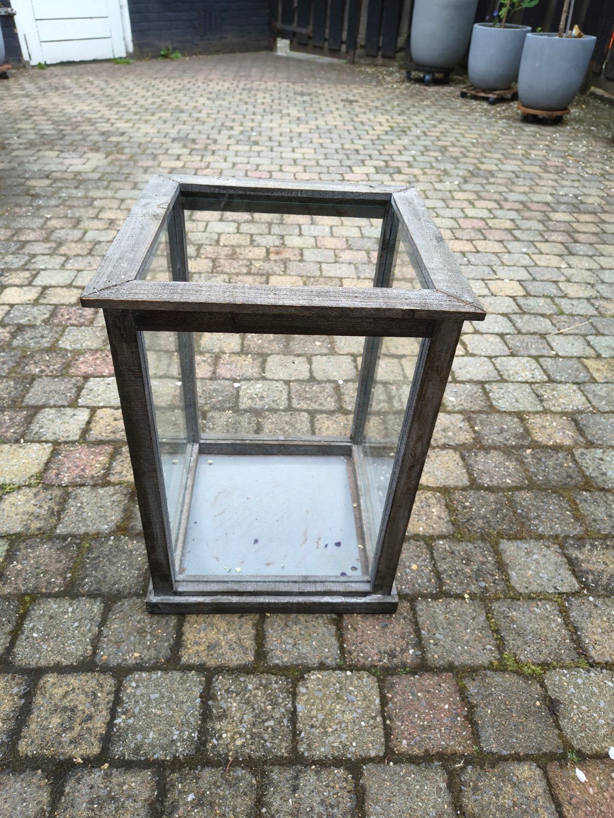 Vierkant windlicht 30x30 hoogte is 45 cm, Ophalen