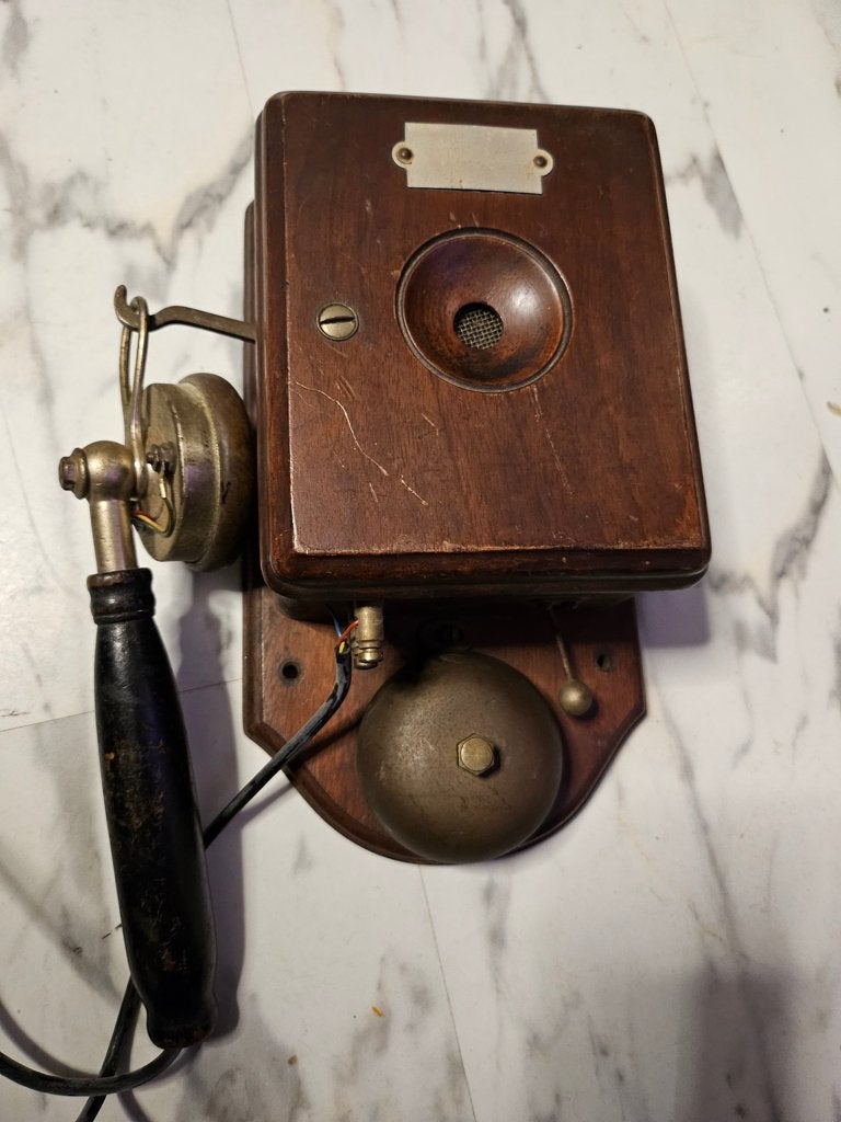 wandtelefoon ( 2x), Ophalen
