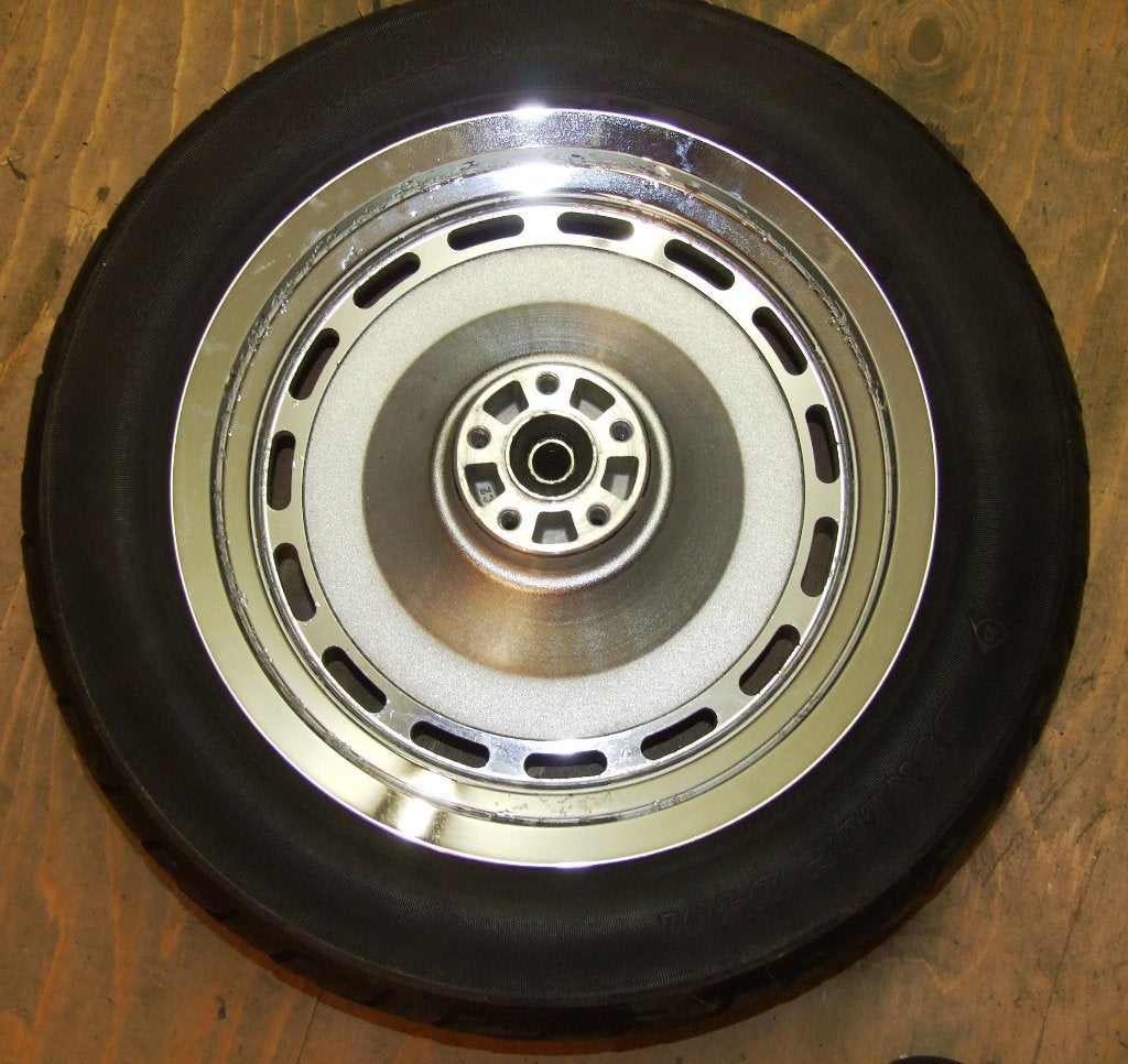 gezocht: chroom slotted wiel Sportster Custom met 25 mm. as, Motoren, Onderdelen | Harley-Davidson, Ophalen