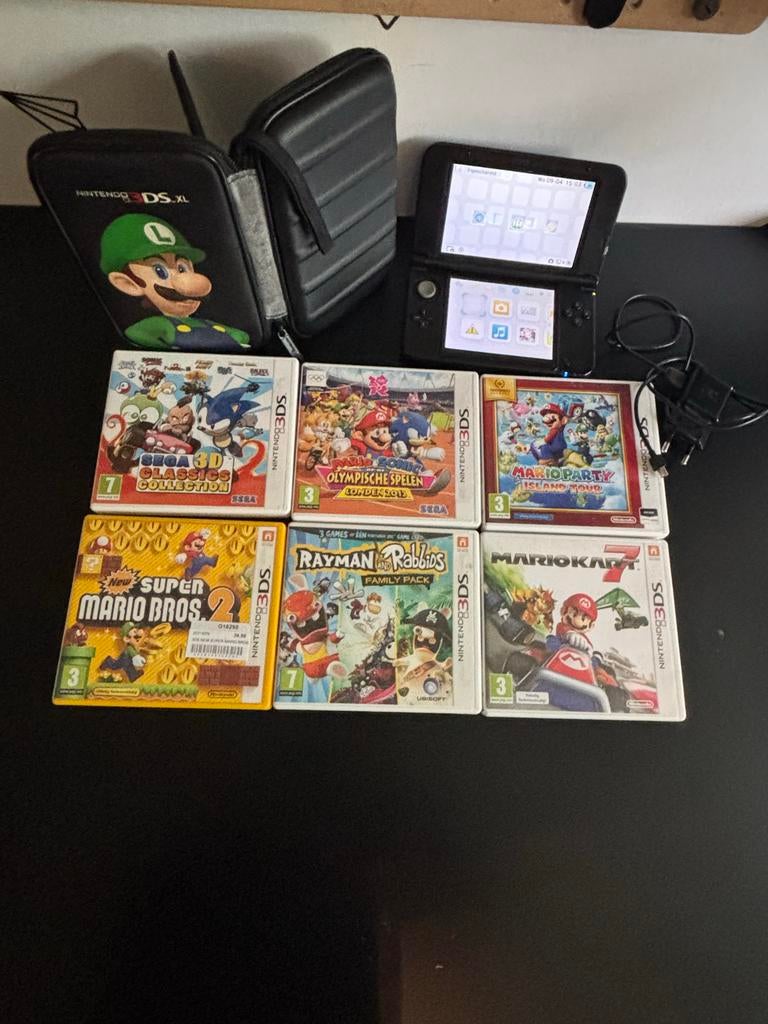 Nintendo 3DS XL met 6 spellen en Mario hoesje, Spelcomputers en Games, Gebruikt, Overige genres, 1 speler, Ophalen of Verzenden
