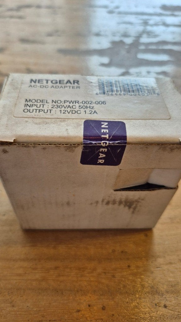 NETGEAR AC-DC Adapter PWR-002-006 - 12VDC 1.2A, Ophalen of Verzenden, Gebruikt, NETGEAR