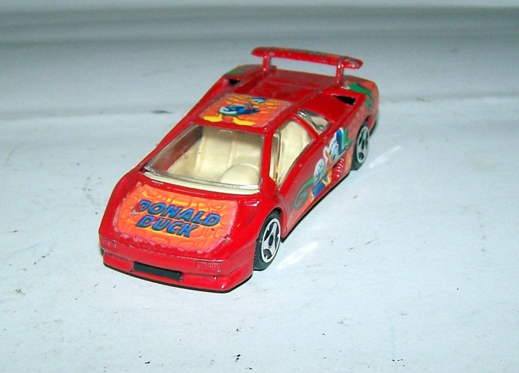 Lamborghini Diablo Donald Duck. Bburago 1/43. Izgs., Ophalen of Verzenden, Zo goed als nieuw, Auto, Overige merken