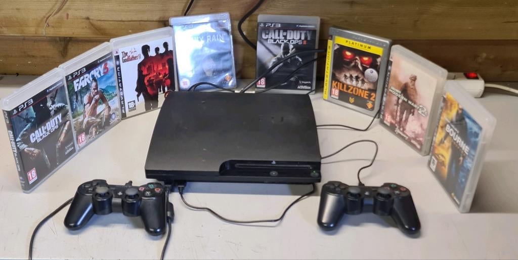 Sony playstation 3 slim + 8 games + 2 controllers, Spelcomputers en Games, Spelcomputers | Sony PlayStation 3, Ophalen of Verzenden
