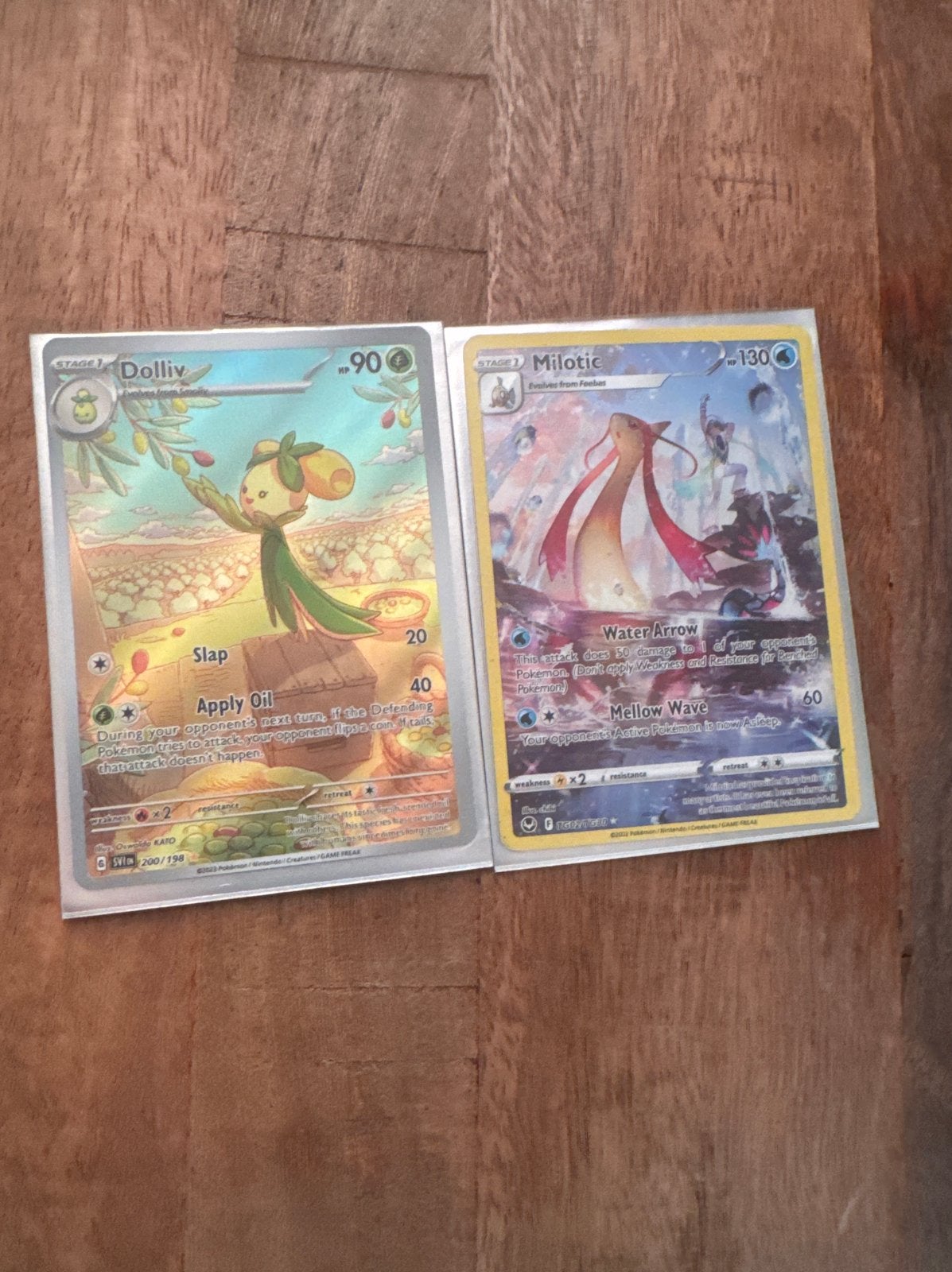 Pokémon kaarten: Doliv en Milotic met sleeves, Ophalen of Verzenden, Zo goed als nieuw, Meerdere kaarten, Foil