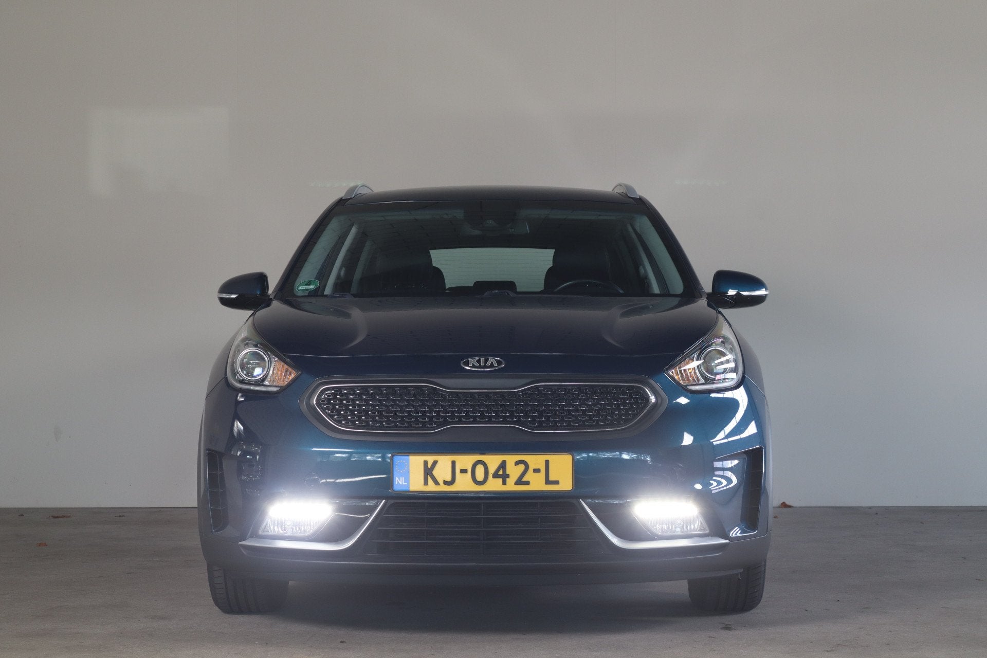 Kia Niro 1.6 GDi Hybrid First Edition NL-Auto! Camera i Appl, Auto's, Gebruikt, Euro 6, Blauw, Leder en Stof