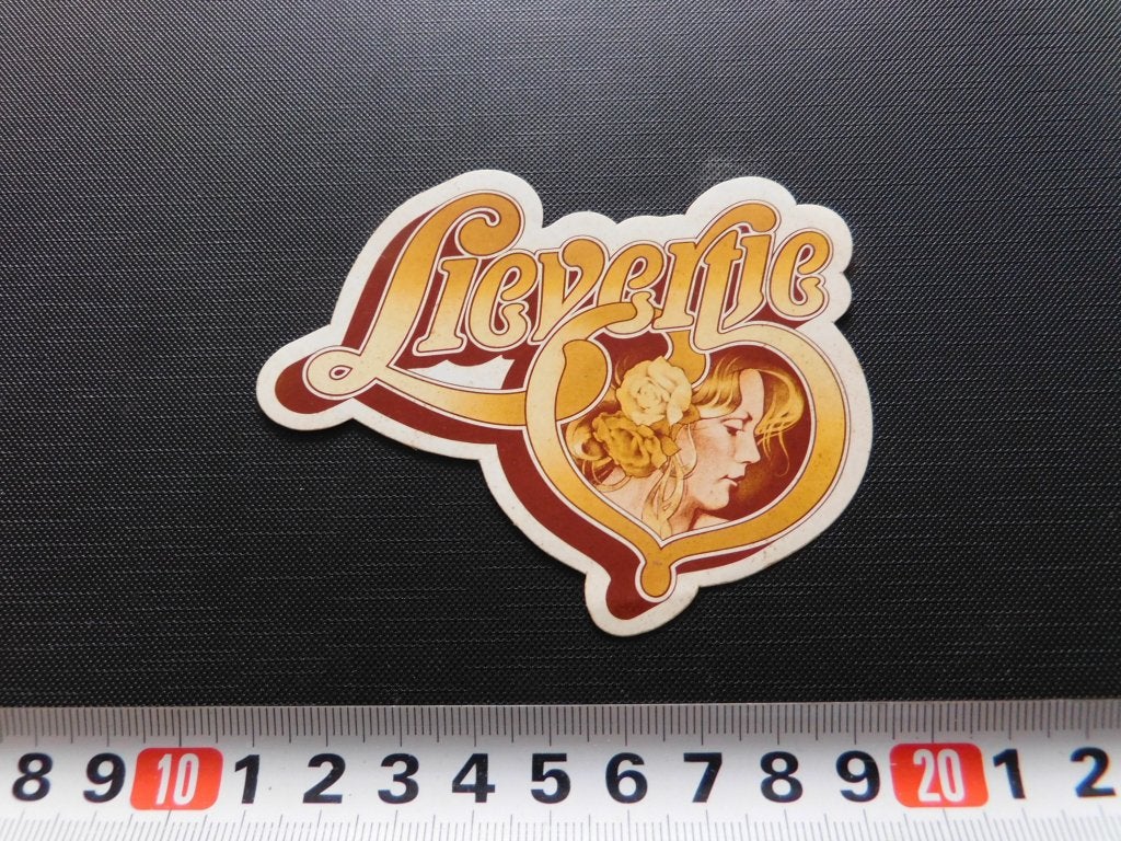 sticker logo vrouw lievertje, Ophalen, Zo goed als nieuw