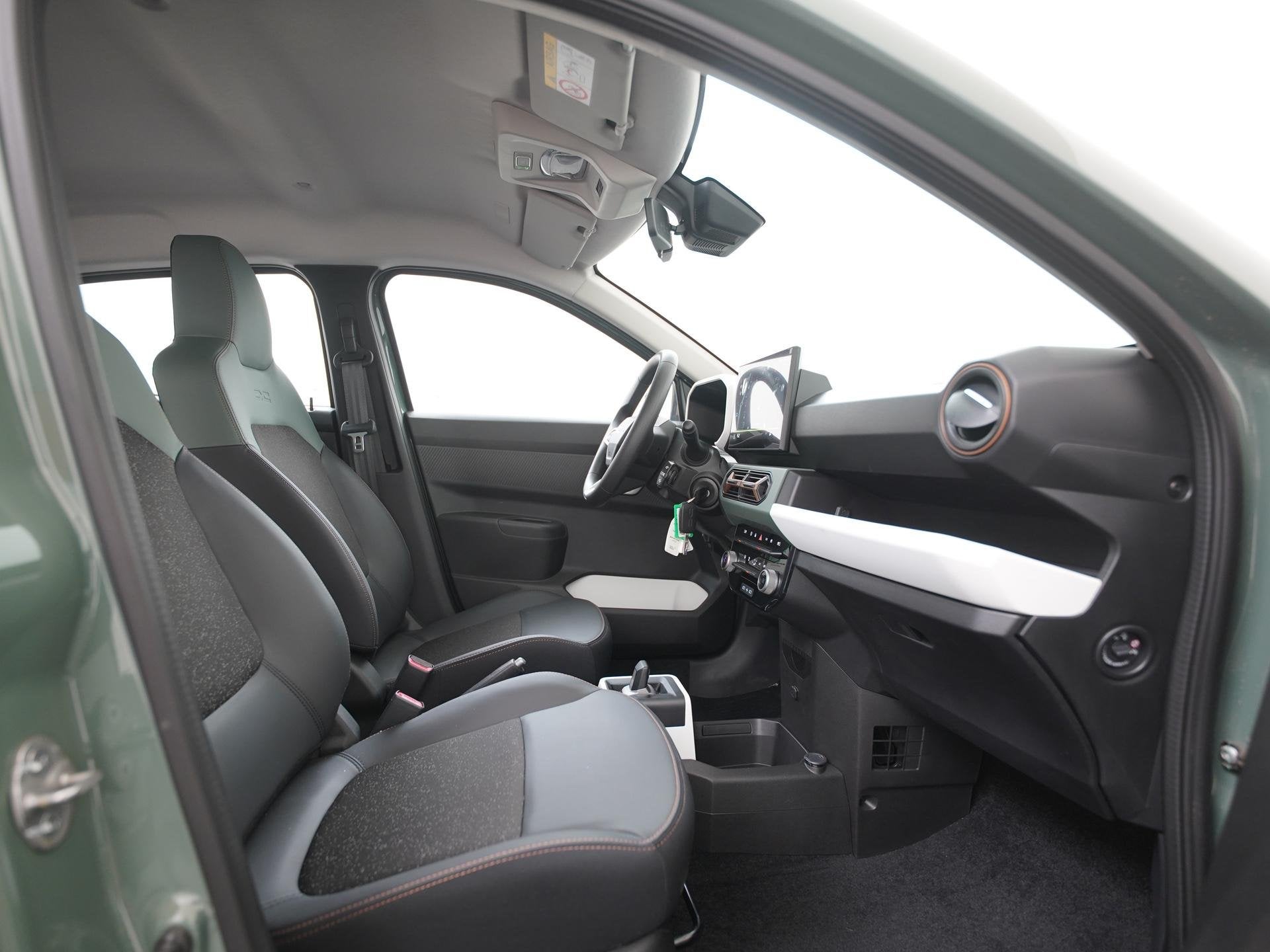 Dacia Spring Extreme 65 26.8 kWh | DC-snelladen | Achteruitc, Auto's, 12 maanden, Gebruikt, 4 stoelen, Leder en Stof