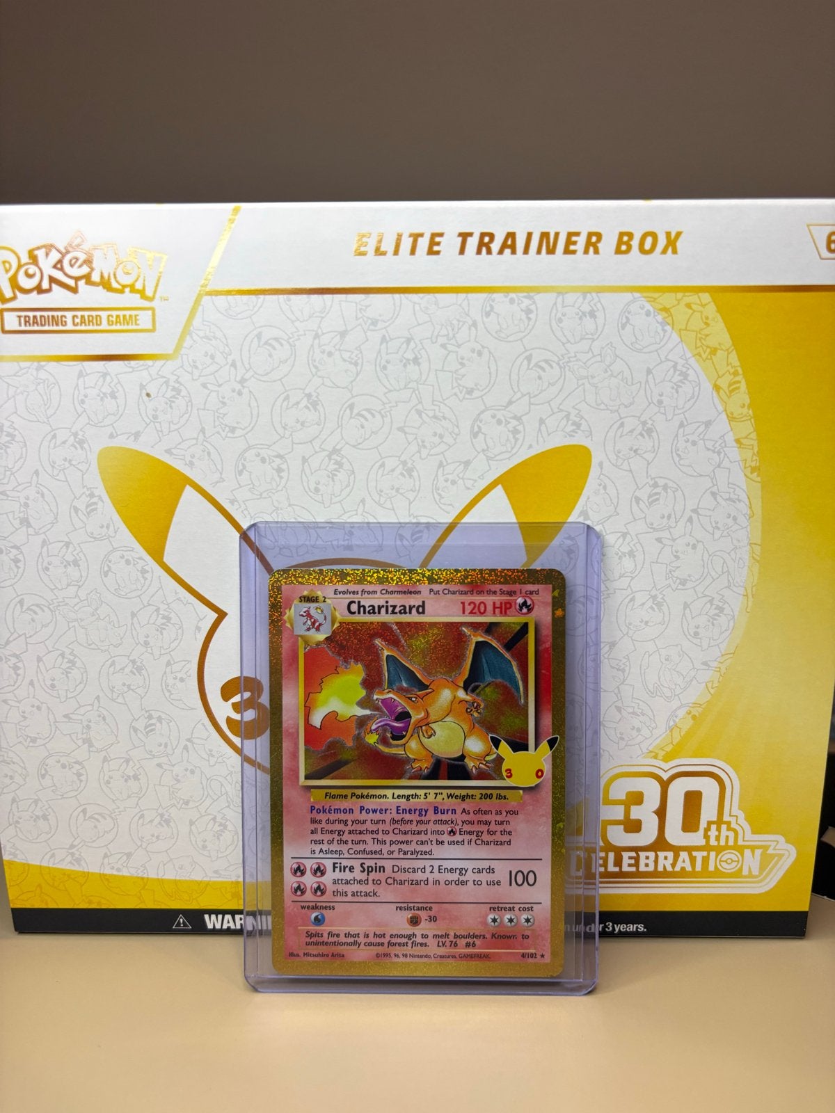 Pokémon Charizard 30th Anniversary Holo - Zo goed als nieuw, Ophalen of Verzenden, Nieuw, Losse kaart, Foil