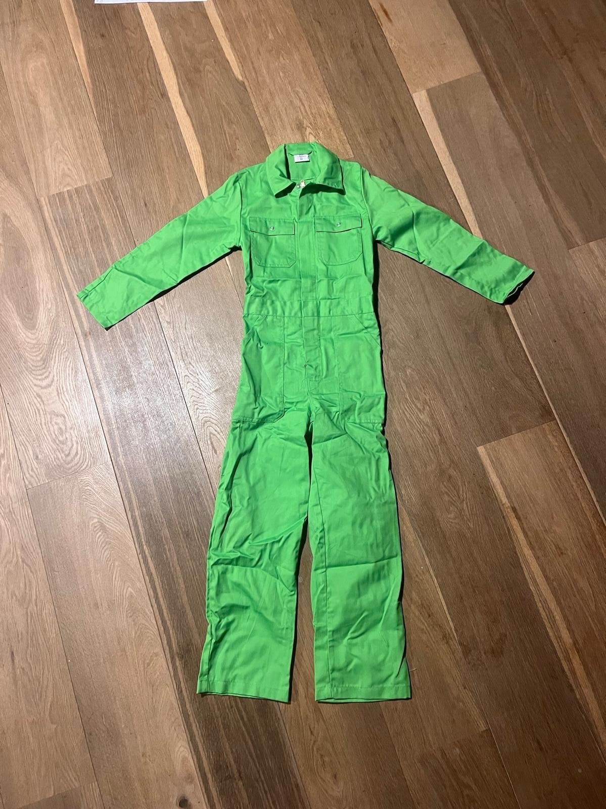 Groene kinderoverall maat 128 - Zo goed als nieuw, Ophalen of Verzenden, Zo goed als nieuw, Jongen of Meisje