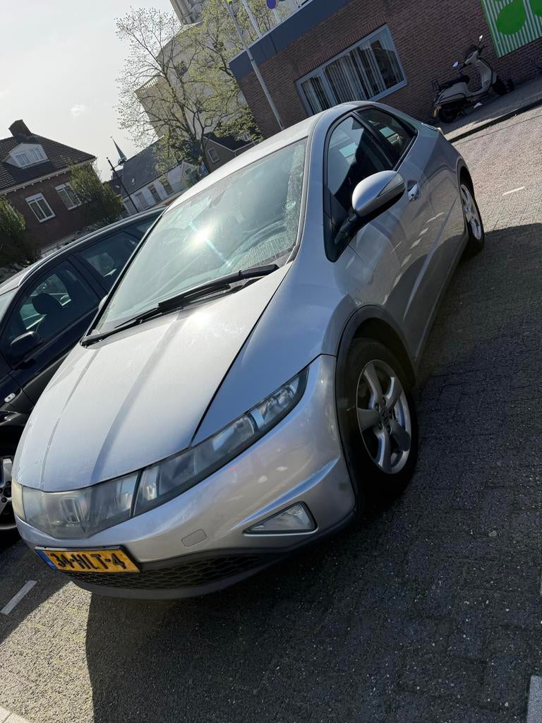 Honda Civic 1.4 I 5DR 2009 Grijs, 83 pk, Stof, Zwart, 4 cilinders
