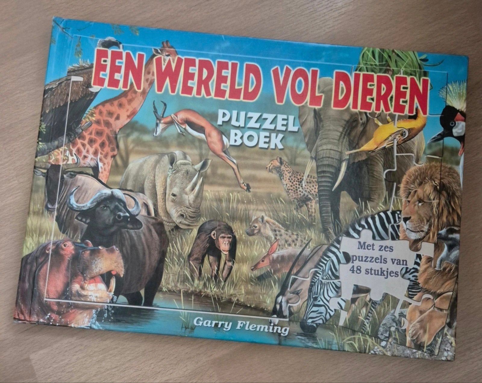 Een Wereld Vol Dieren Puzzelboek - Garry Fleming, Kinderen en Baby's, Ophalen of Verzenden, 10 tot 50 stukjes, Zo goed als nieuw